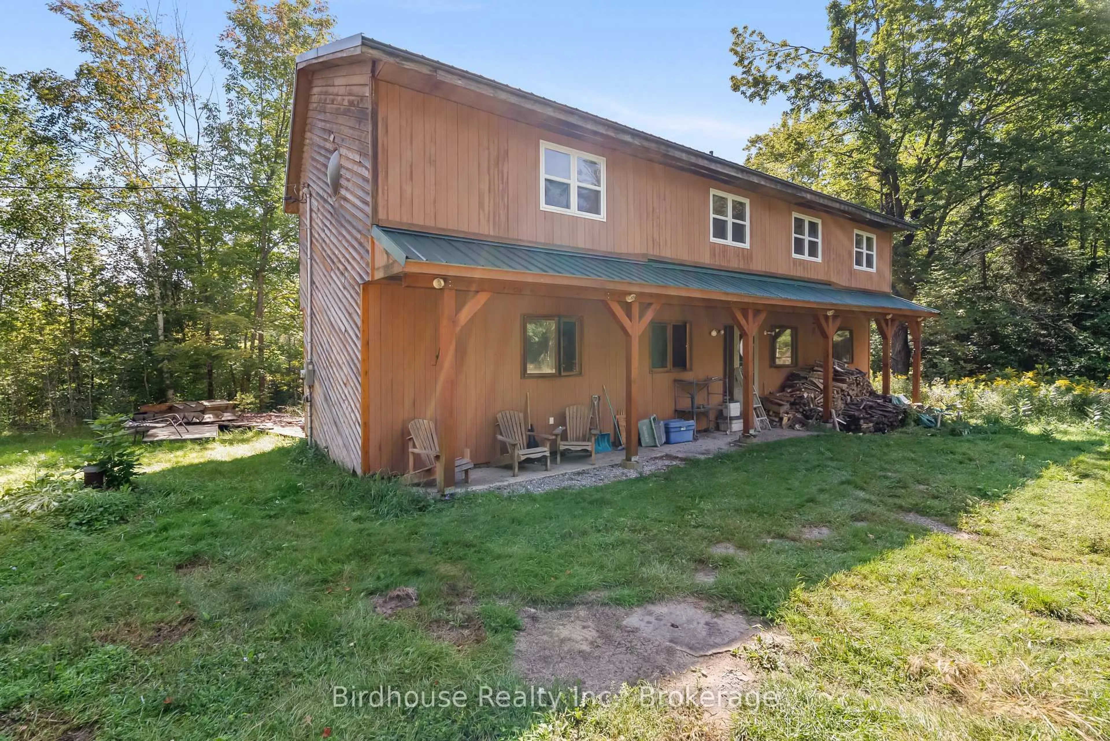 A pic from outside/outdoor area/front of a property/back of a property/a pic from drone, unknown for 79 Honeysuckle Rd, Kawartha Lakes Ontario K0M 2B0
