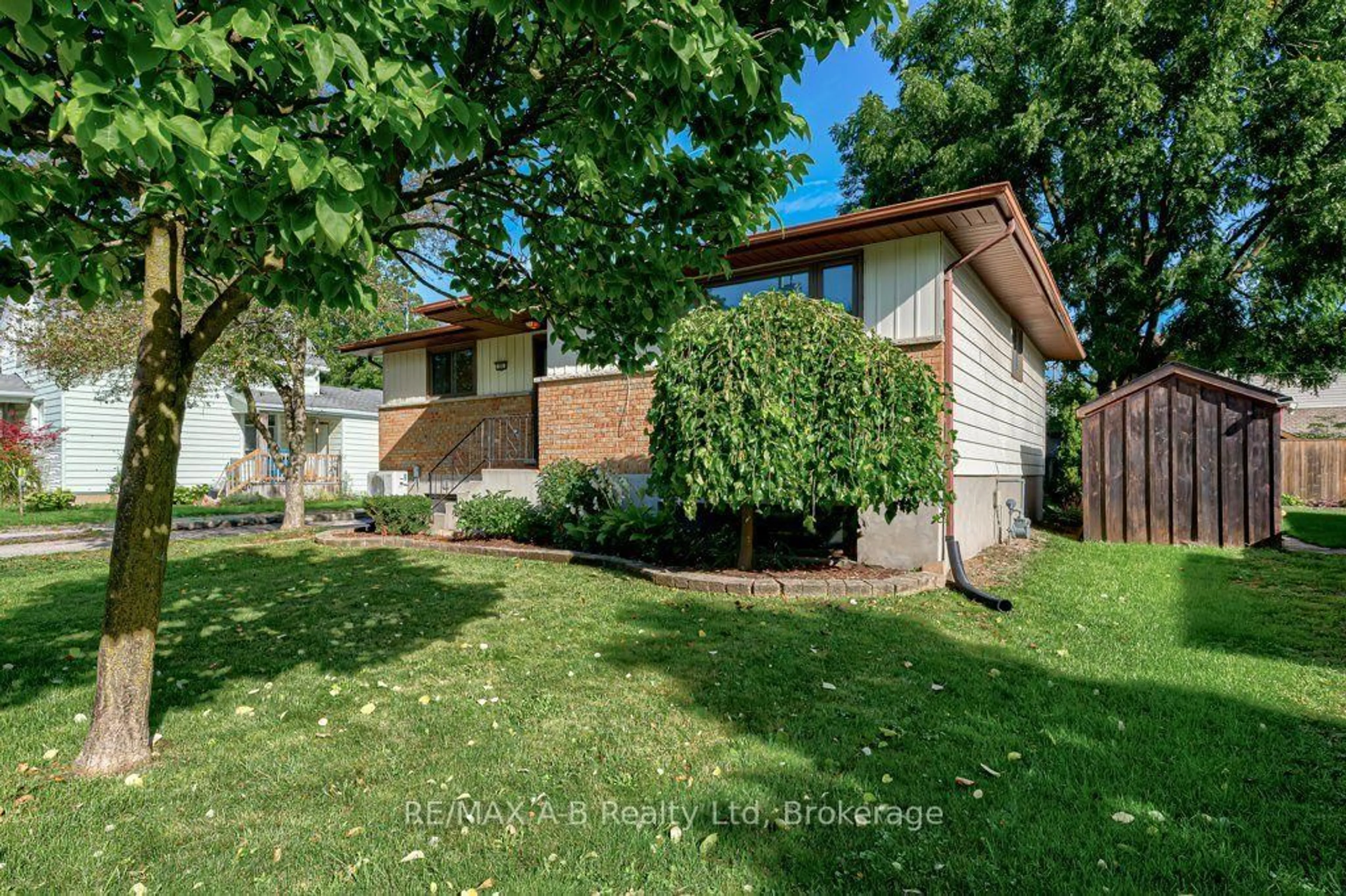 Home with brick exterior material, street for 56 Brant St, Stratford Ontario N5A 3X2