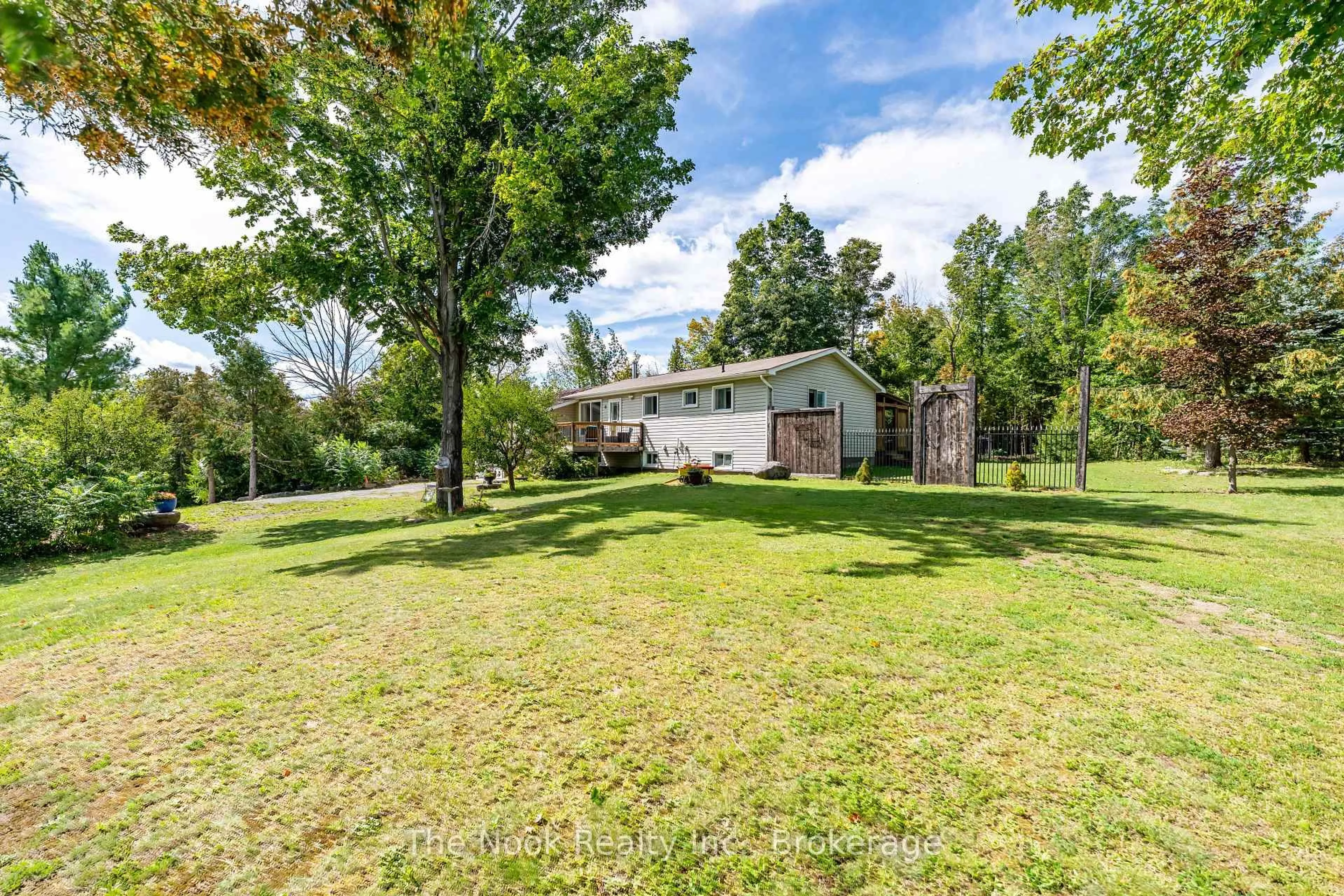 A pic from outside/outdoor area/front of a property/back of a property/a pic from drone, unknown for 6 Cedar Terr, Trent Lakes Ontario K0L 1J0