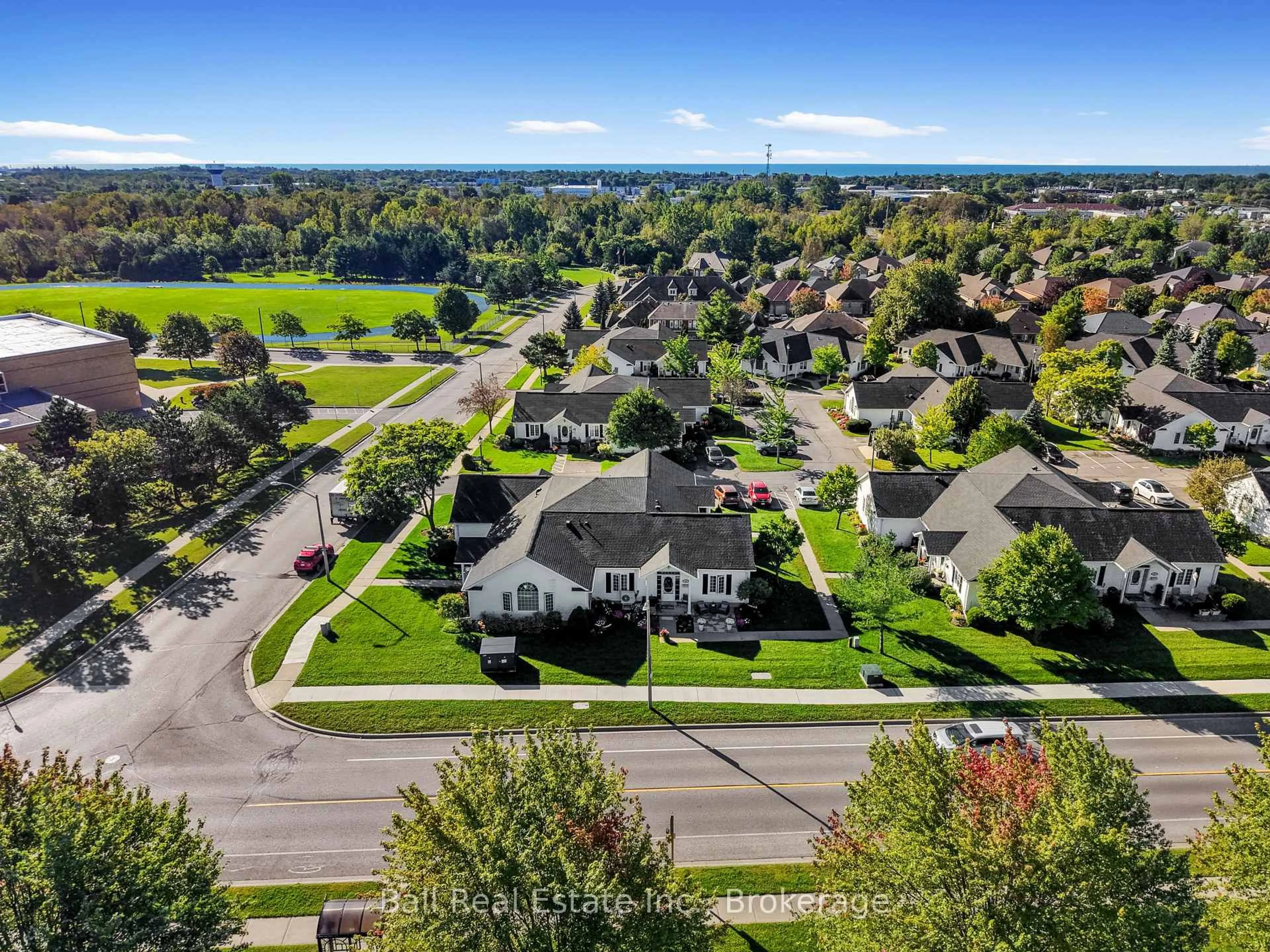 A pic from outside/outdoor area/front of a property/back of a property/a pic from drone, street for 1055 Birchwood Tr #303, Cobourg Ontario K9A 5Y1