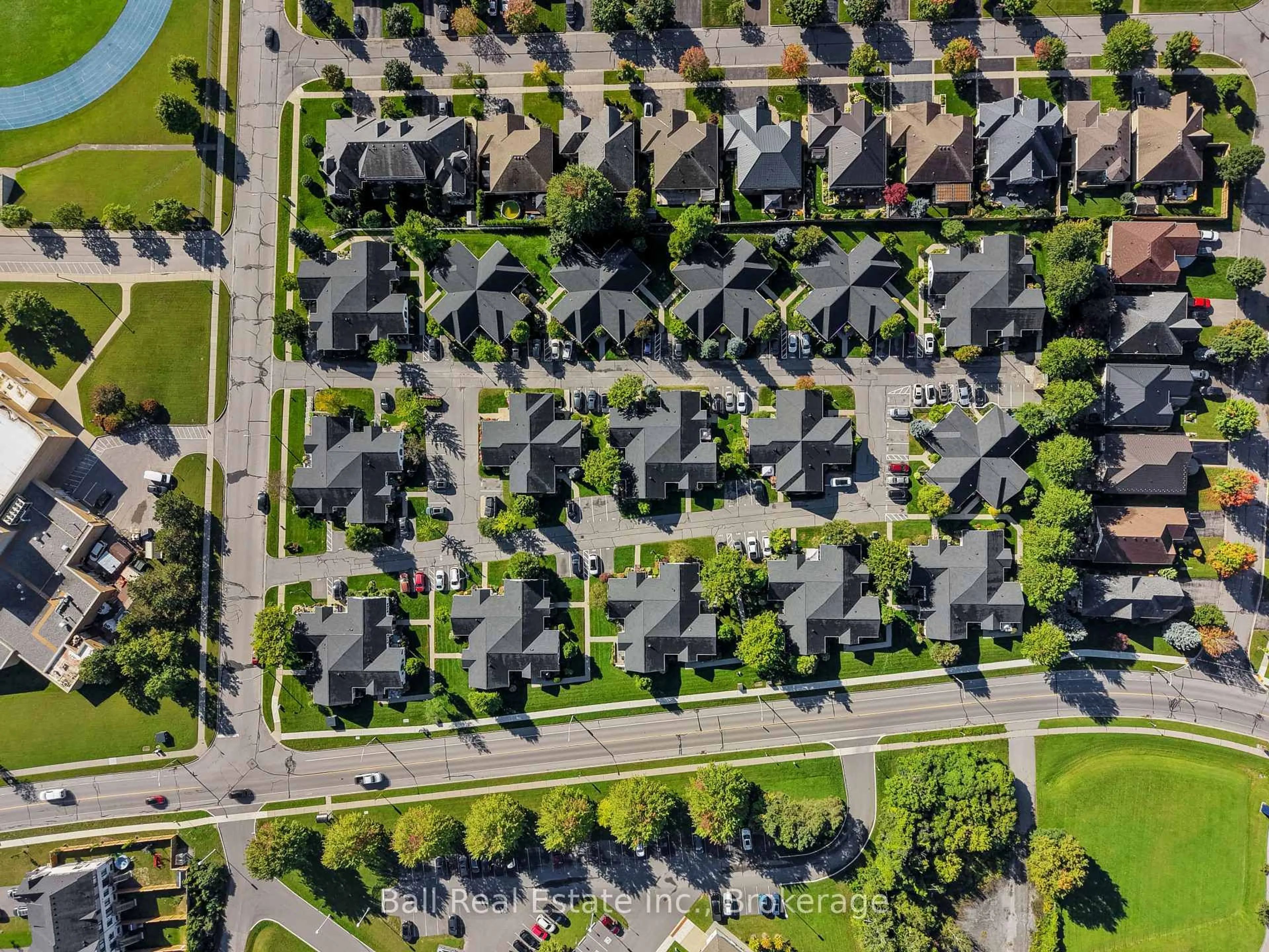 A pic from outside/outdoor area/front of a property/back of a property/a pic from drone, street for 1055 Birchwood Tr #303, Cobourg Ontario K9A 5Y1