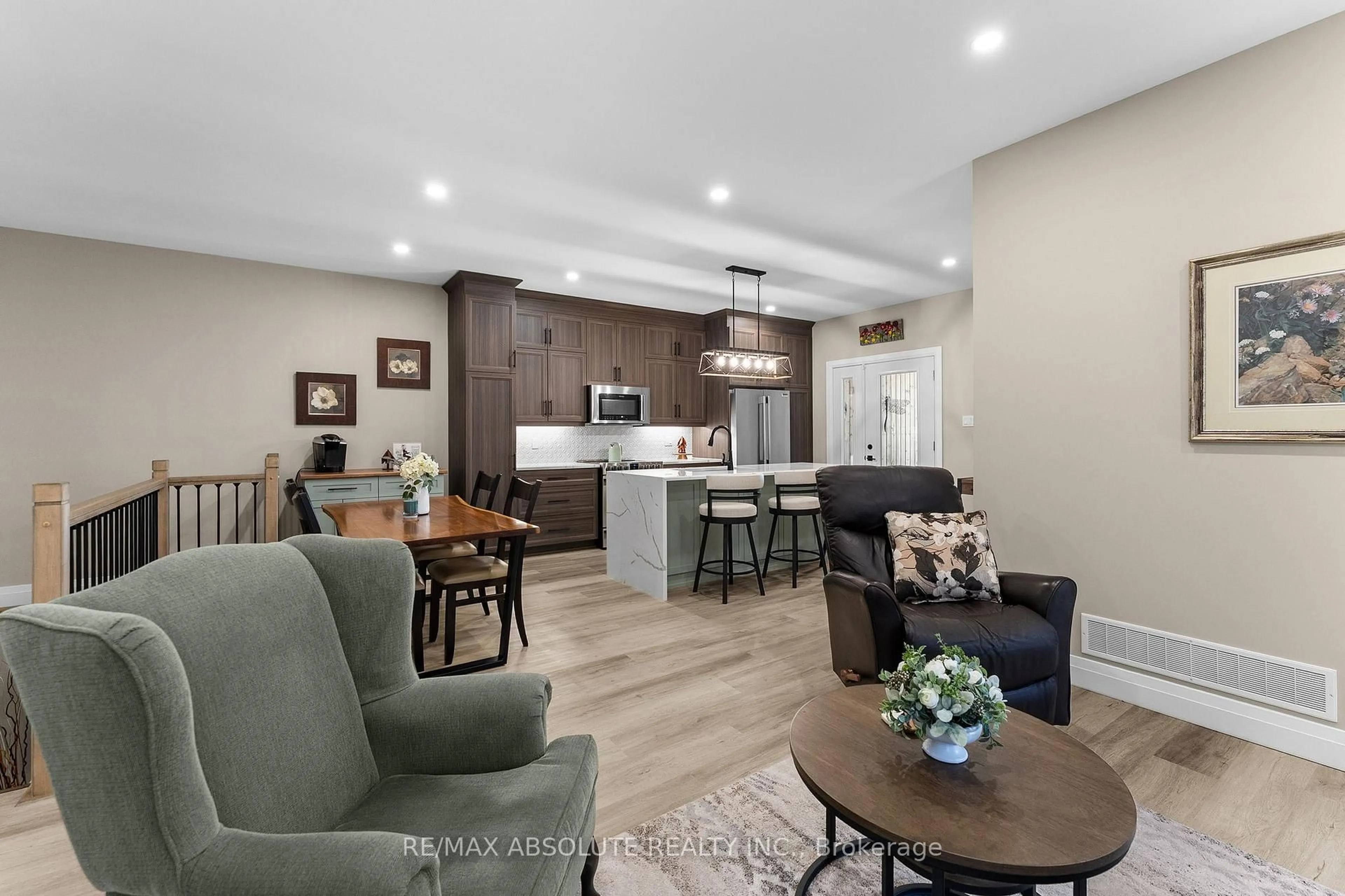 Open concept kitchen, wood/laminate floor for 323 Forestview Cres, Renfrew Ontario K7V 0C4