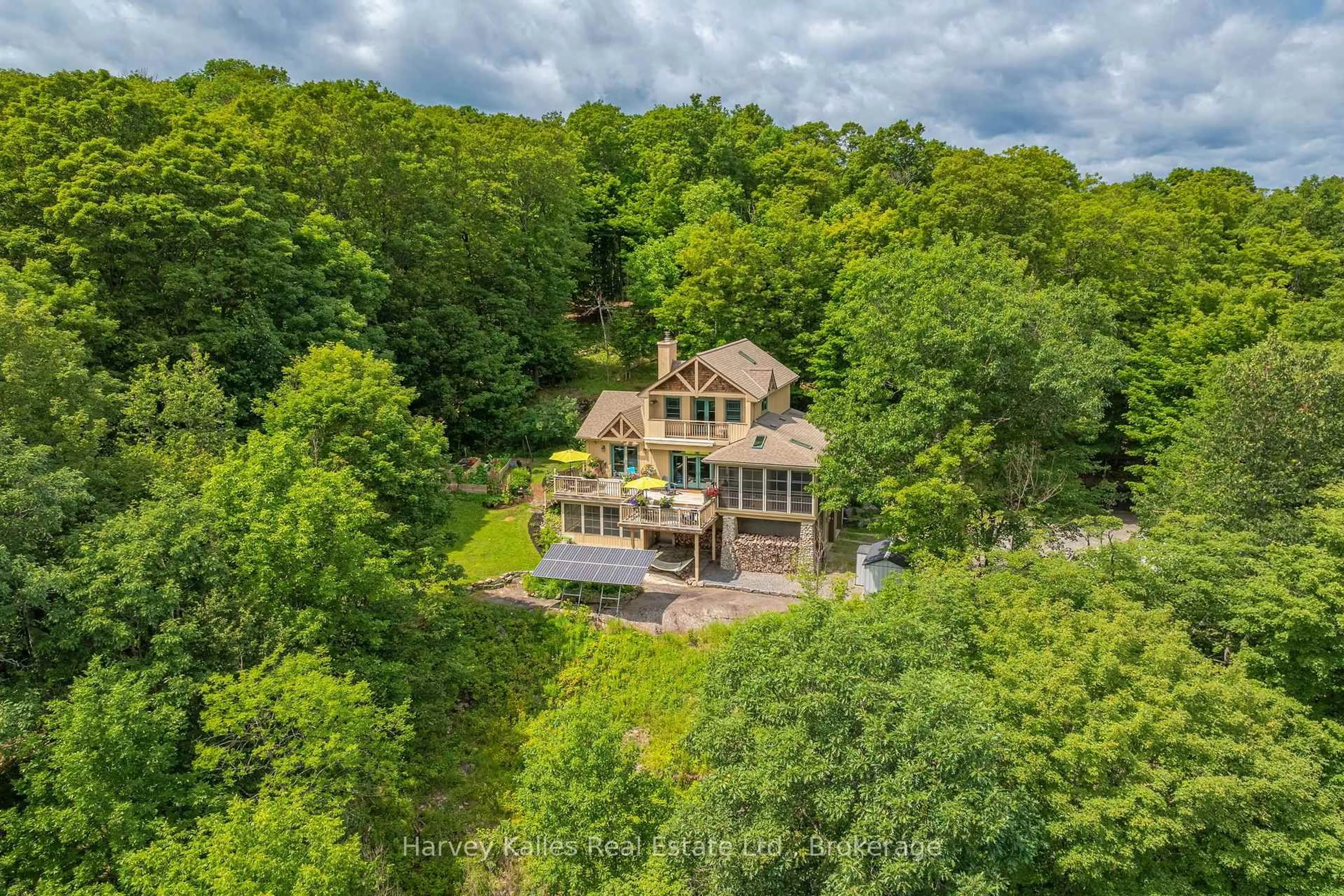 A pic from outside/outdoor area/front of a property/back of a property/a pic from drone, water/lake/river/ocean view for 34 Logging Tr, Huntsville Ontario P0B 1M0