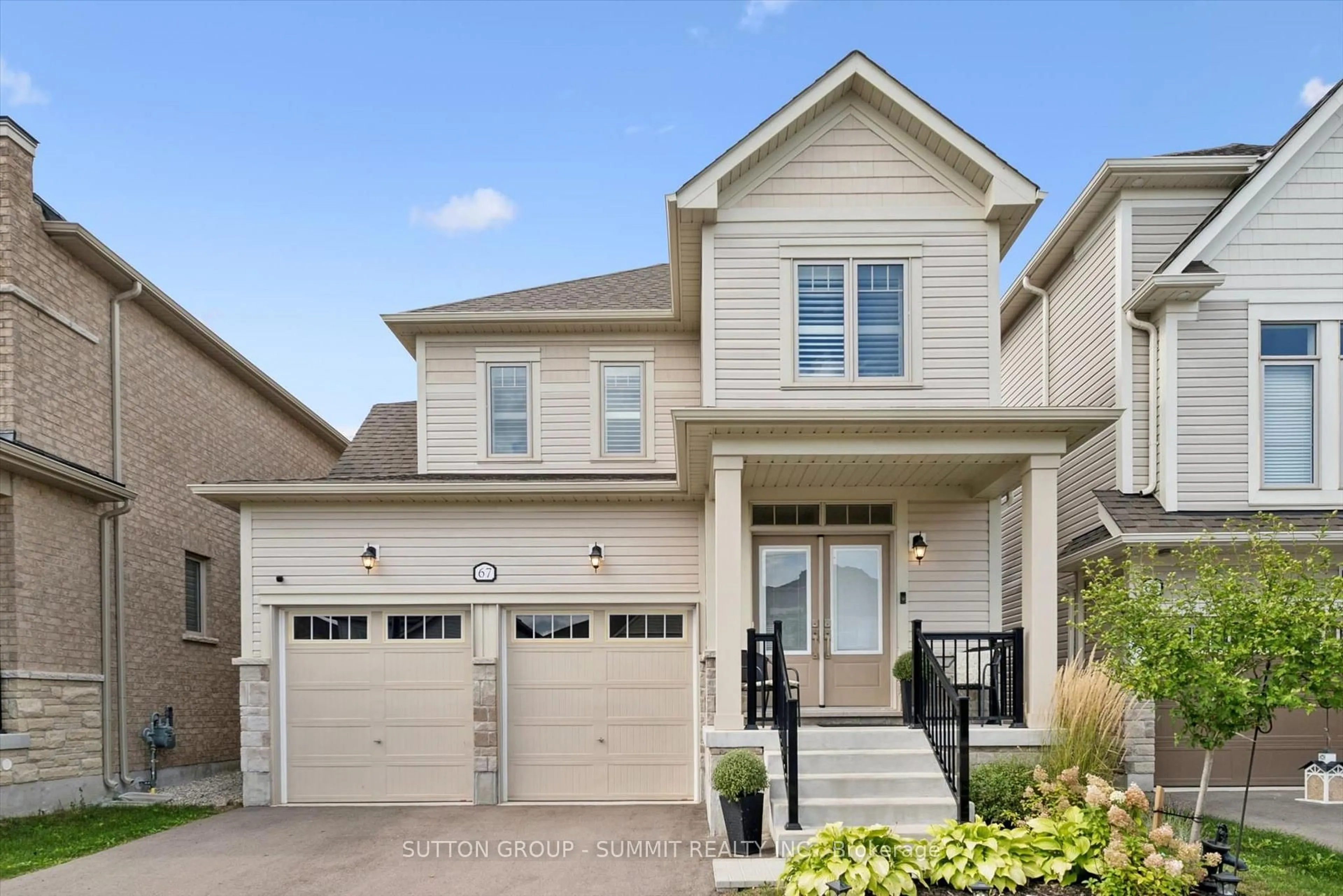 Home with vinyl exterior material, street for 67 Harpin Way, Centre Wellington Ontario N1M 0H8