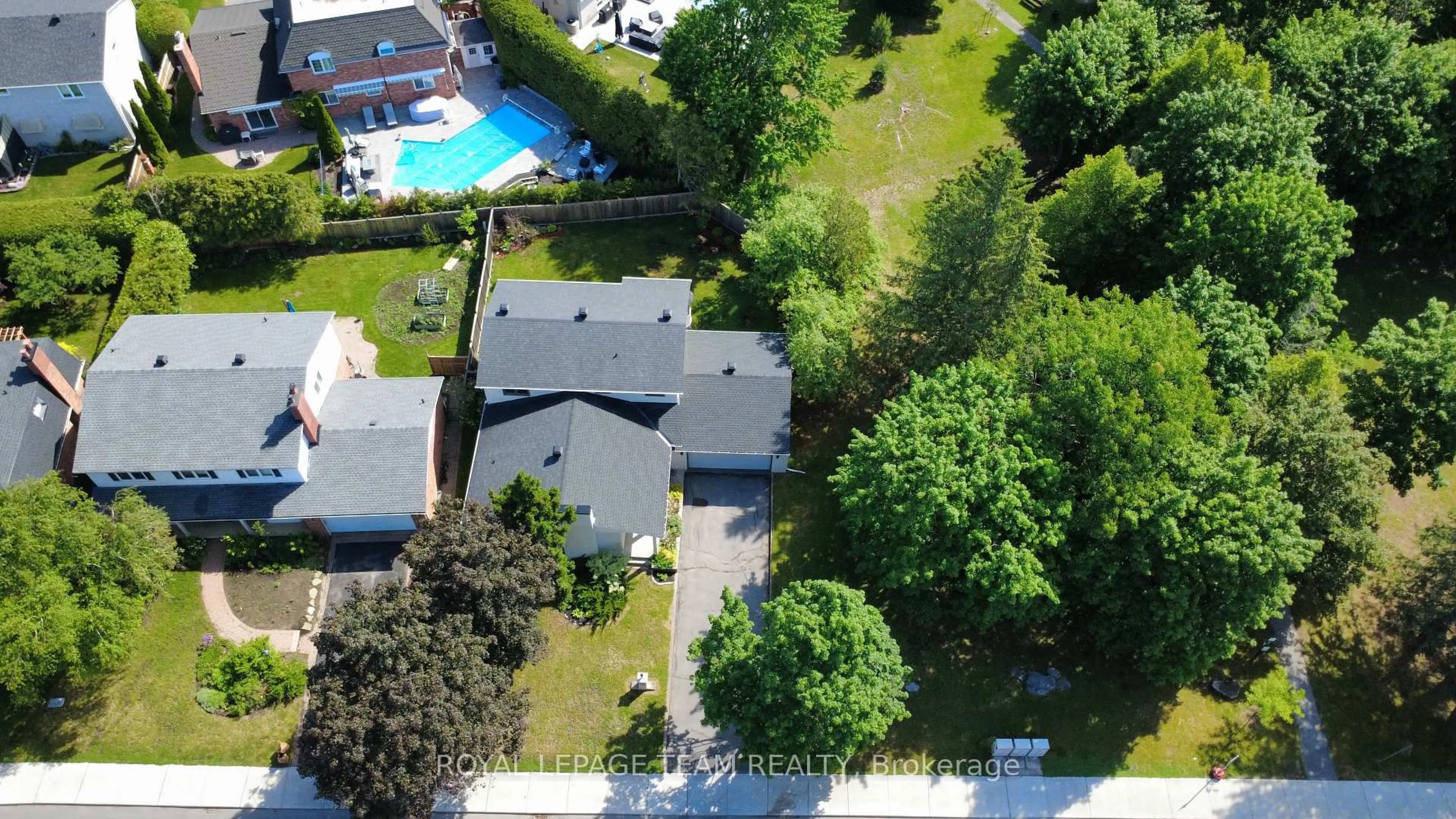 A pic from outside/outdoor area/front of a property/back of a property/a pic from drone, street for 61 Amberwood Cres, Ottawa Ontario K2E 7C2