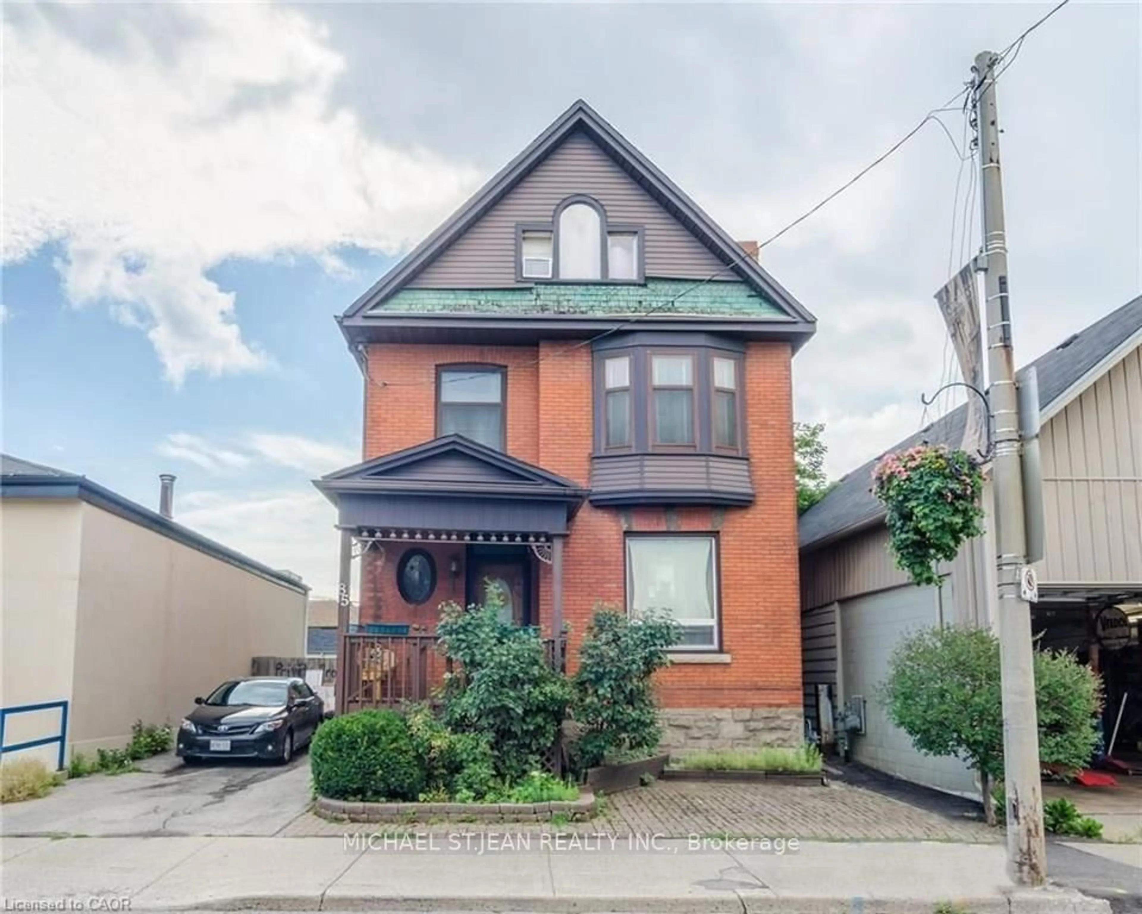 Home with brick exterior material, street for 85 Locke St, Hamilton Ontario L8P 4A3