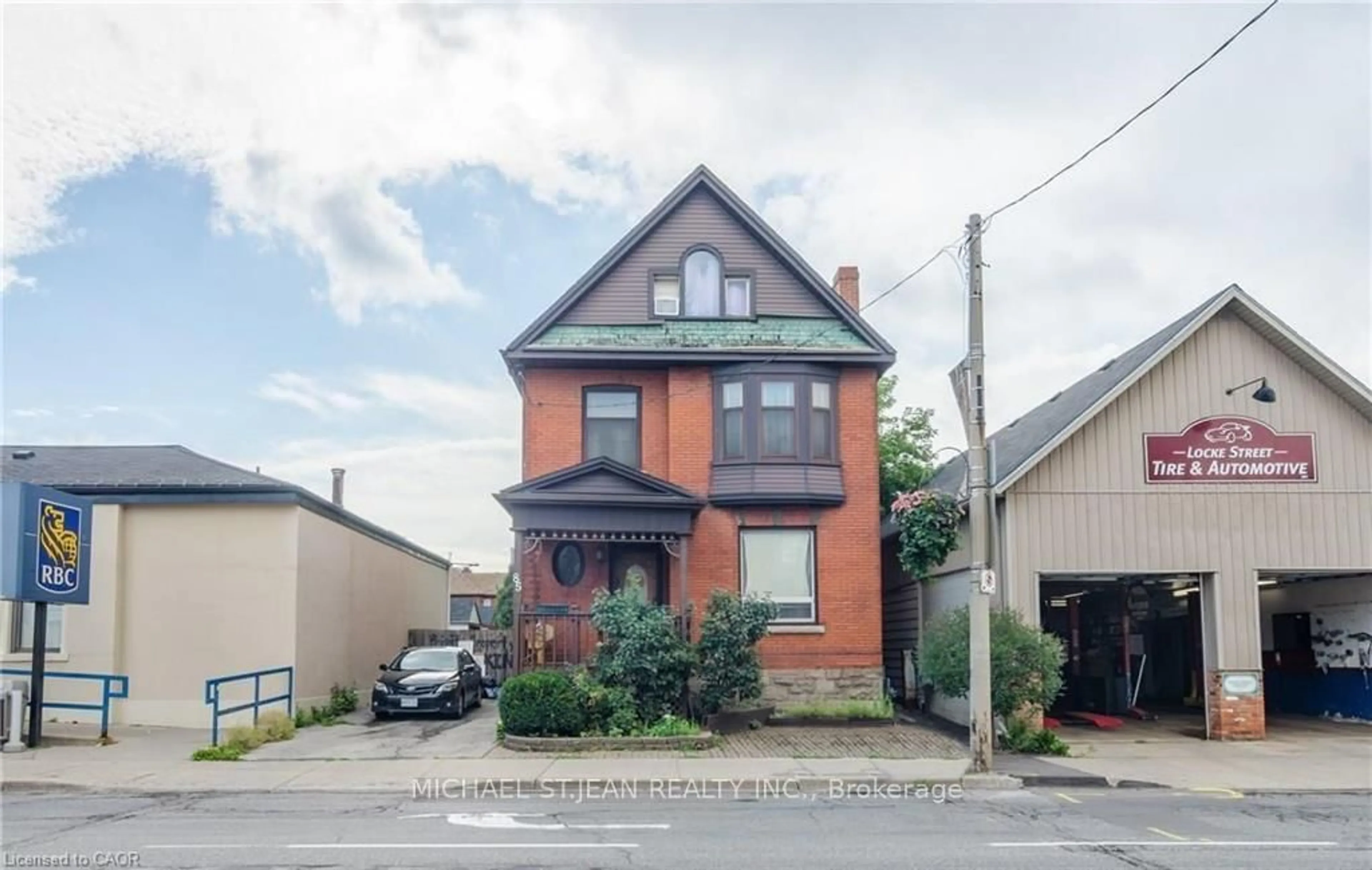 Home with brick exterior material, street for 85 Locke St, Hamilton Ontario L8P 4A3