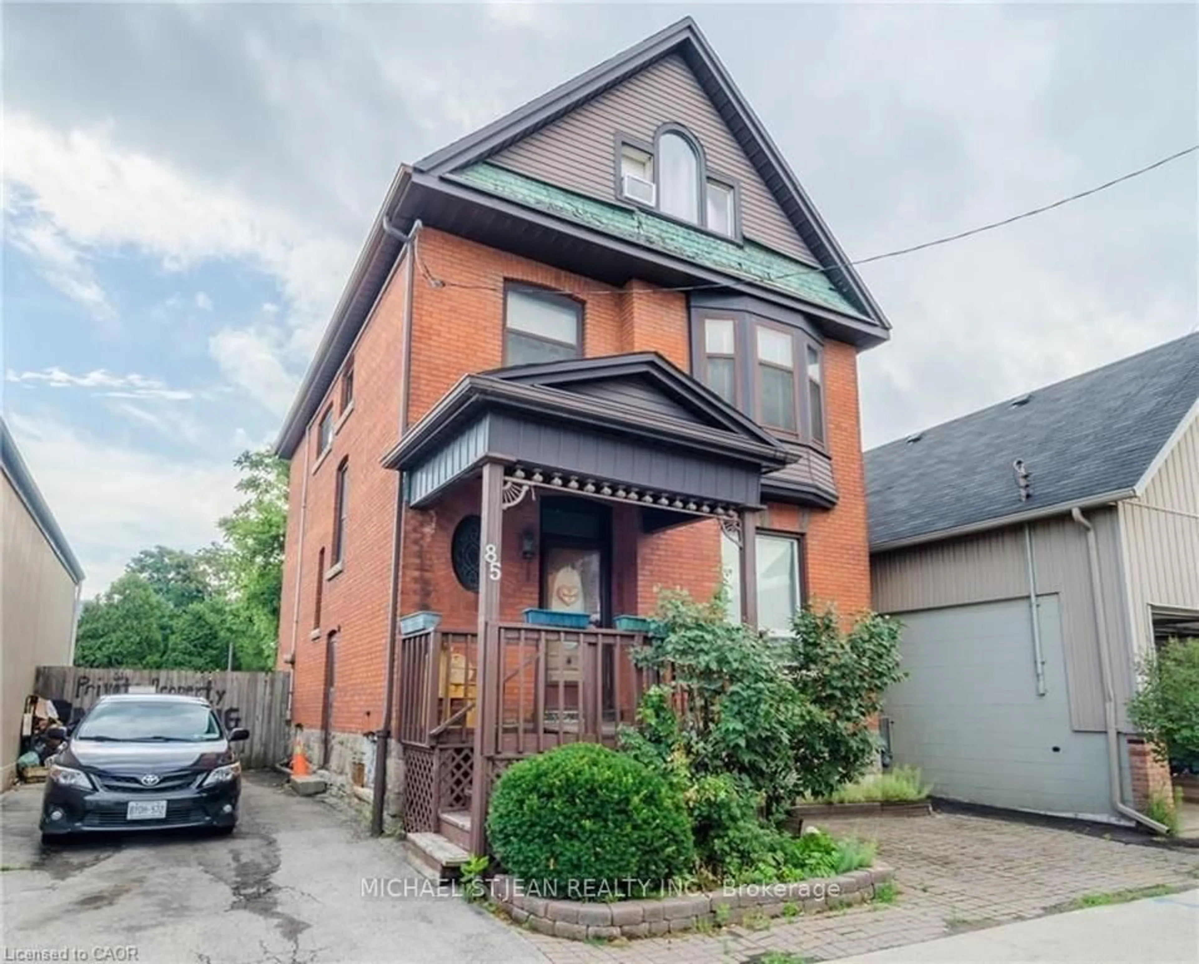 Home with brick exterior material, street for 85 Locke St, Hamilton Ontario L8P 4A3