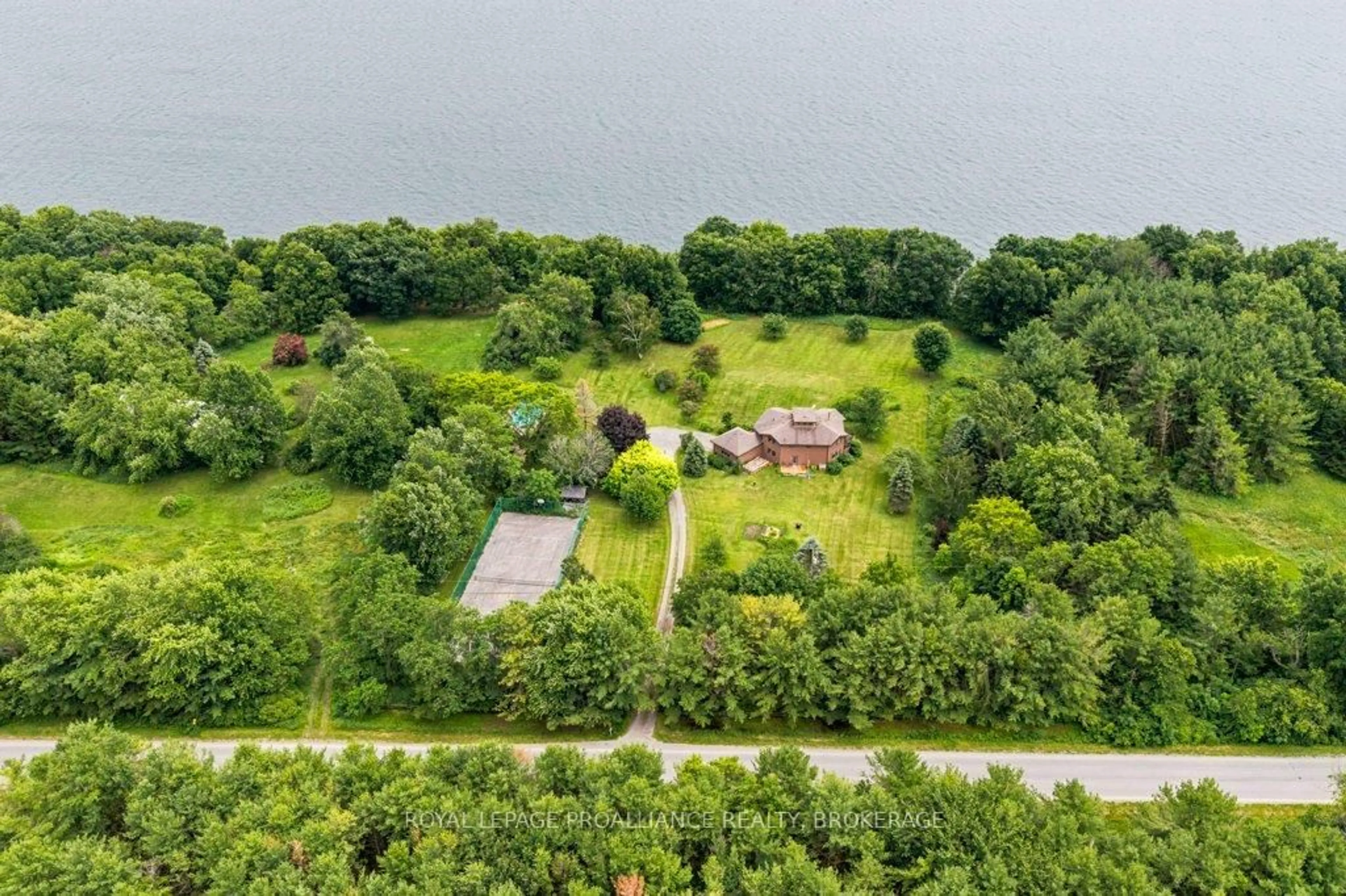A pic from outside/outdoor area/front of a property/back of a property/a pic from drone, water/lake/river/ocean view for 2576 Howe Island Dr, Gananoque Ontario K7G 2V6