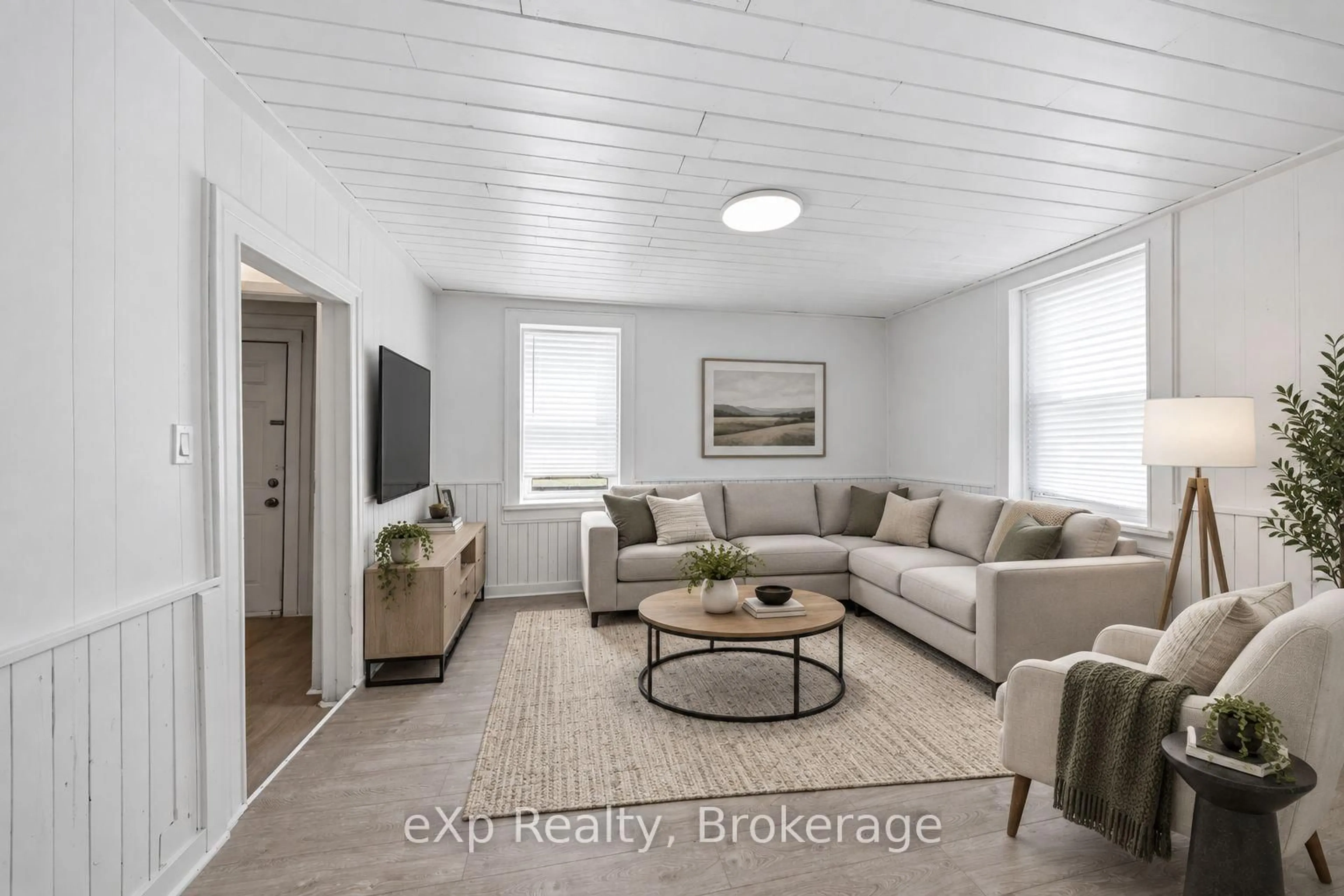 Living room with furniture, wood/laminate floor for 188 Dundas St, Quinte West Ontario K8V 3R2