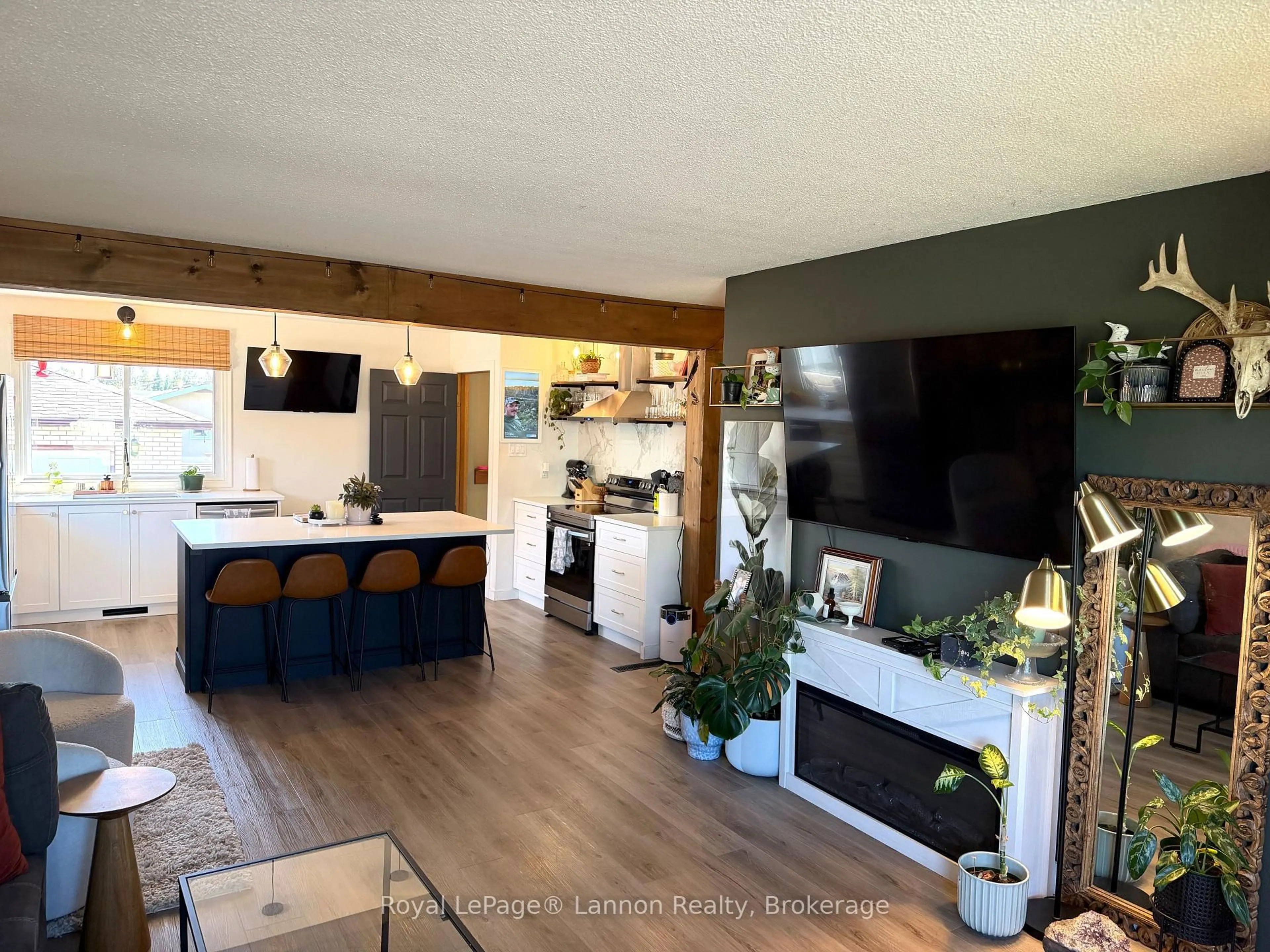 Open concept kitchen, wood/laminate floor for 417 Strand Ave, Thunder Bay Ontario P7B 5A8