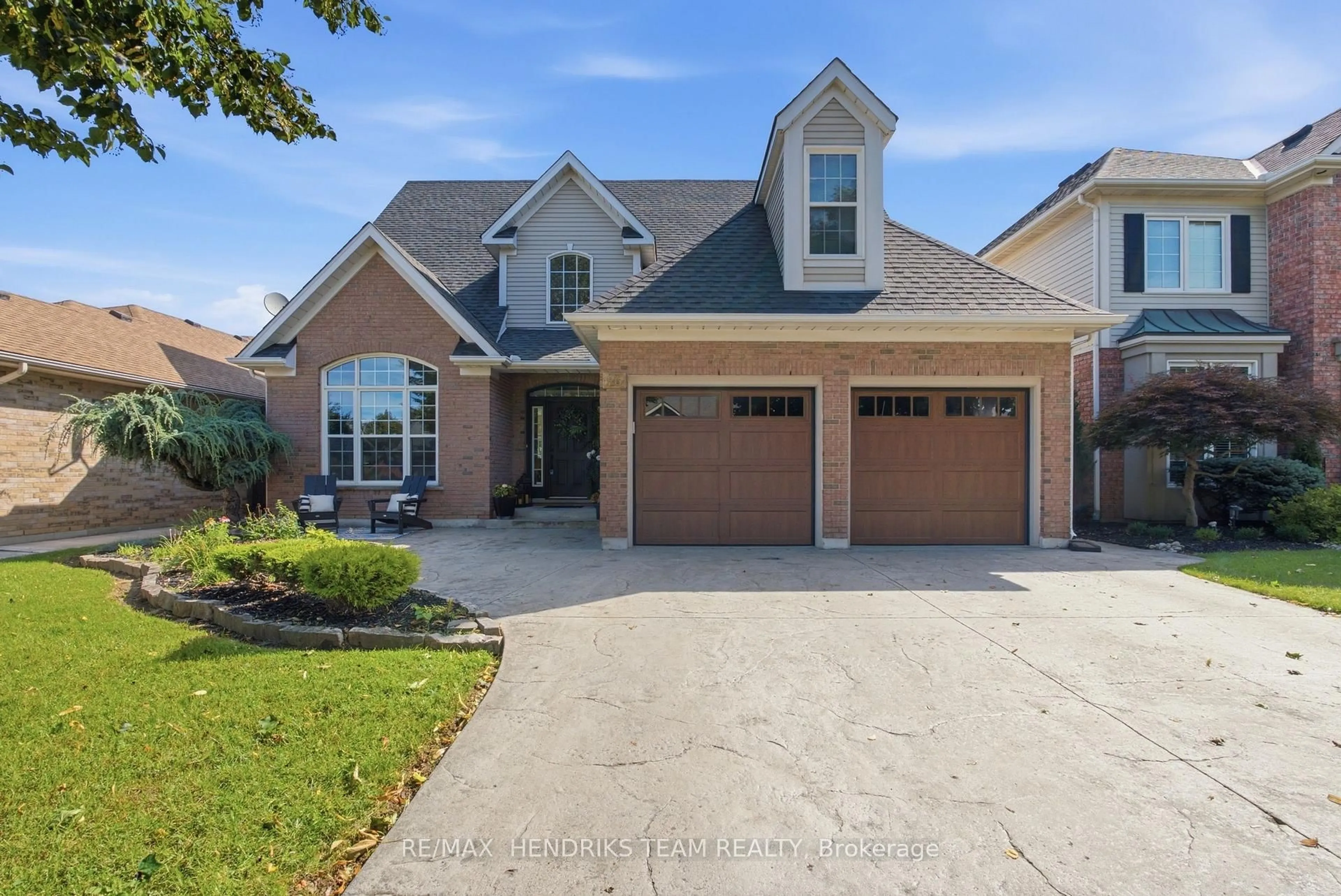 Home with brick exterior material, street for 26 Countryside Dr, St. Catharines Ontario L2W 1C3