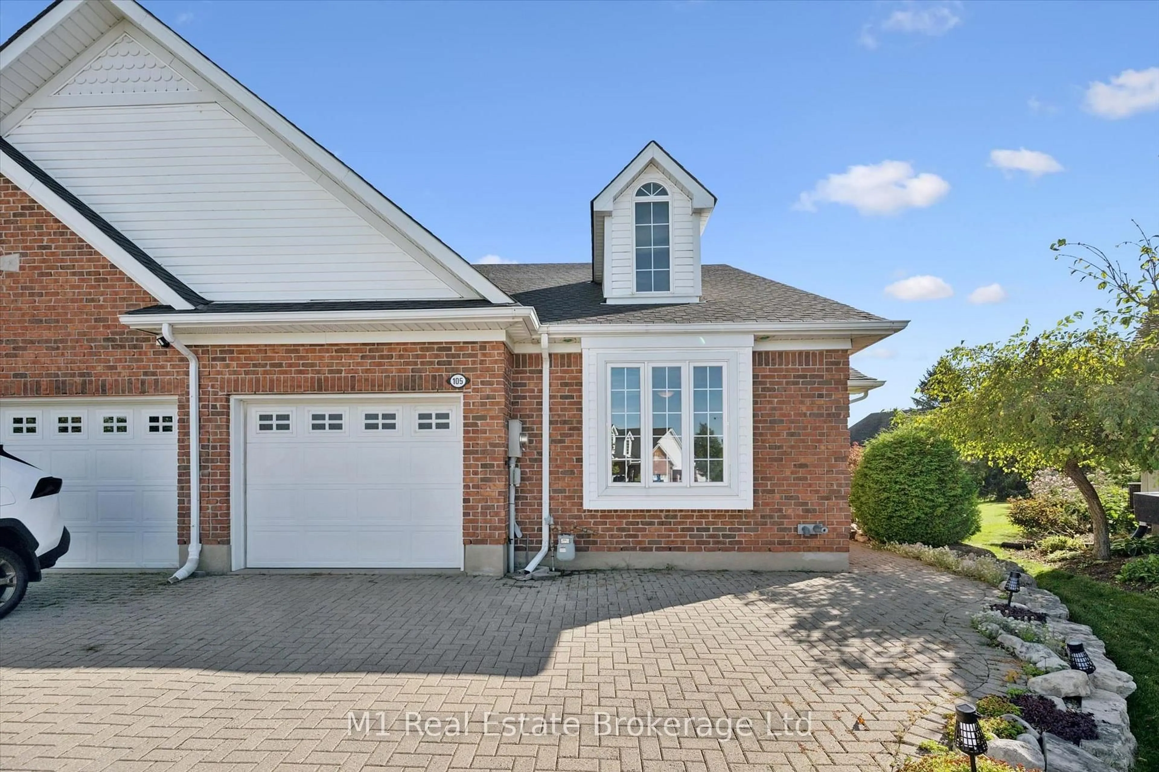 Home with brick exterior material, street for 105 Riverwalk Pl, Guelph/Eramosa Ontario N0B 2K0