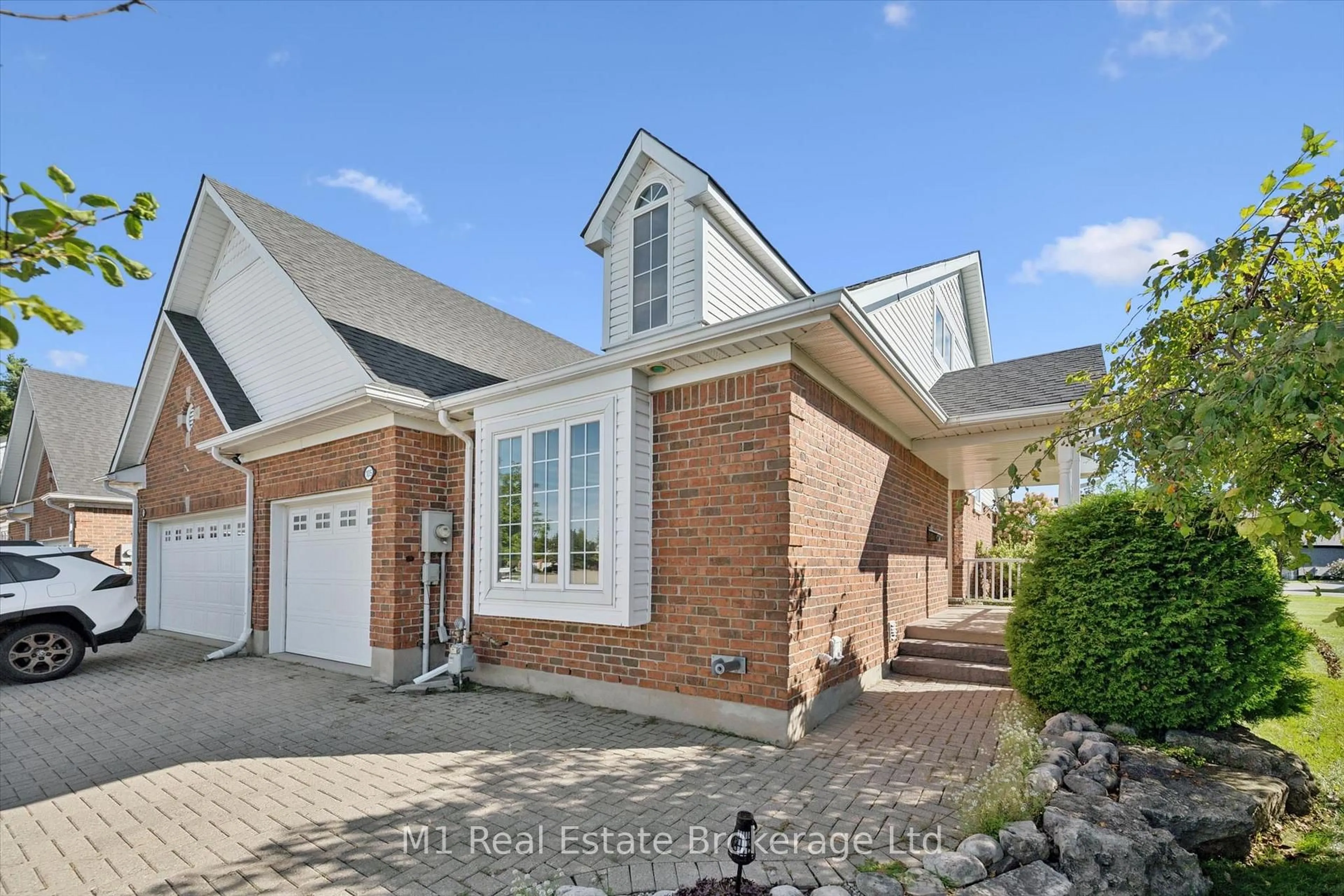 Home with brick exterior material, street for 105 Riverwalk Pl, Guelph/Eramosa Ontario N0B 2K0