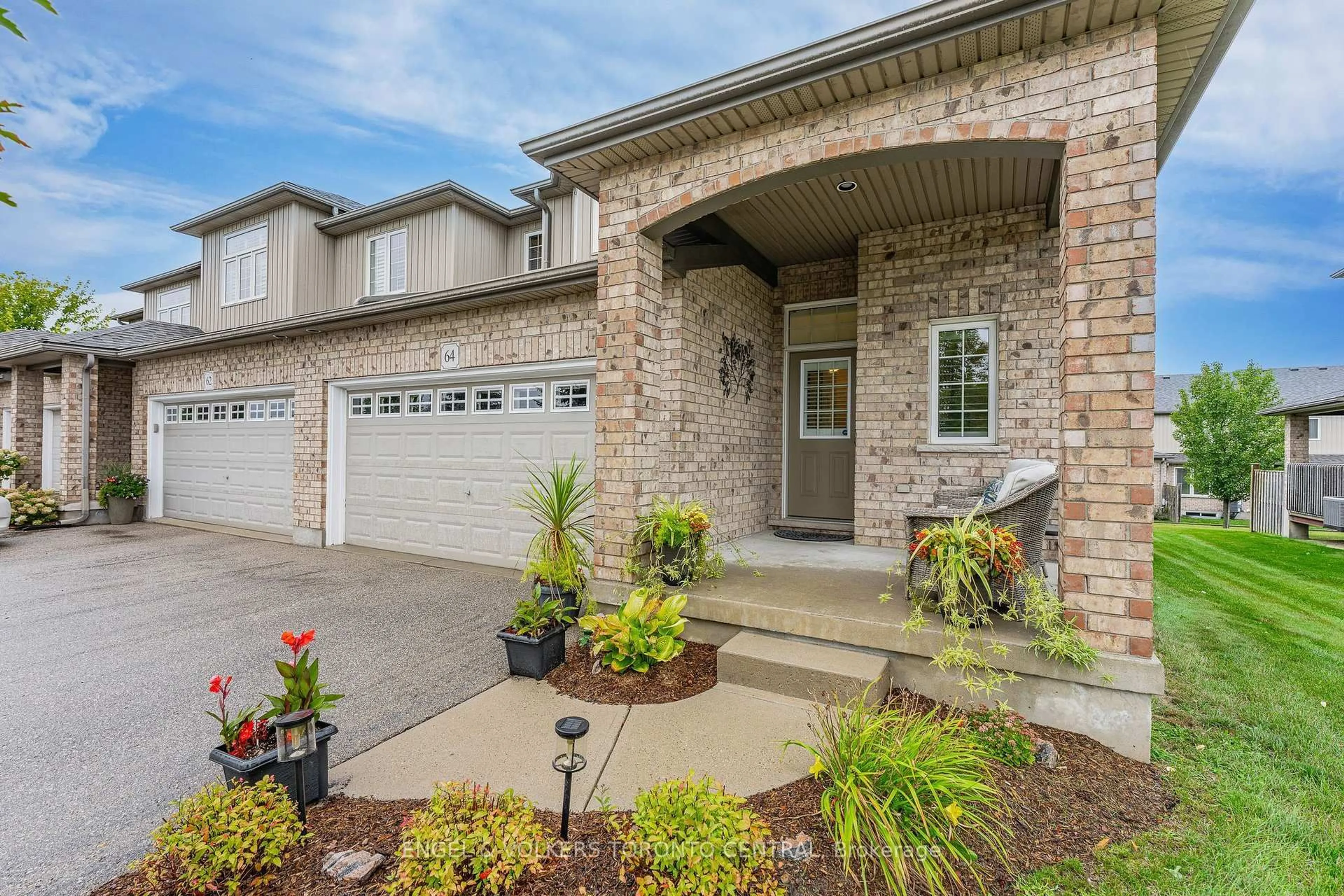 Home with brick exterior material, street for 31 Townsend Dr #64, Woolwich Ontario N0B 1M0