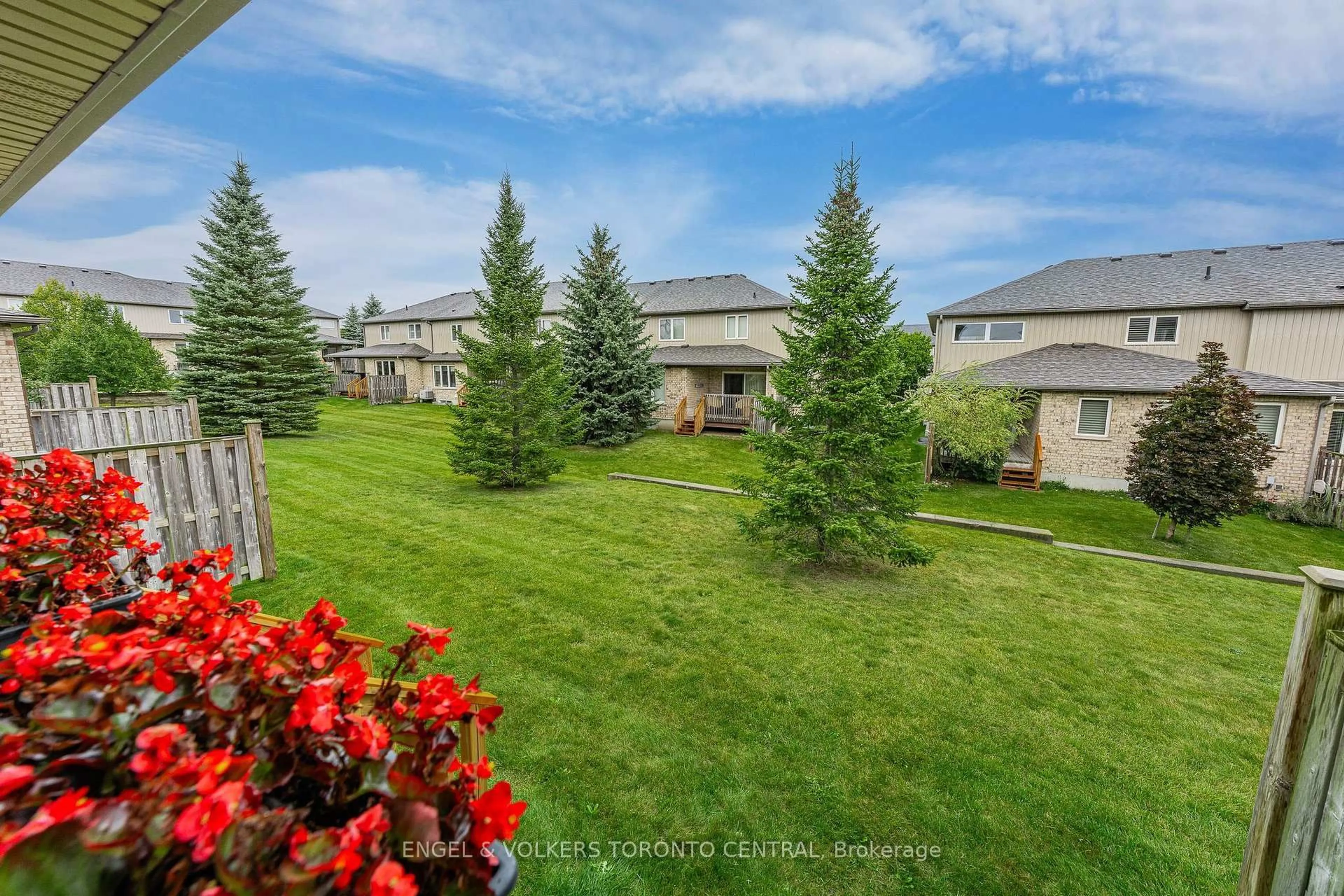 A pic from outside/outdoor area/front of a property/back of a property/a pic from drone, mountain view for 31 Townsend Dr #64, Woolwich Ontario N0B 1M0