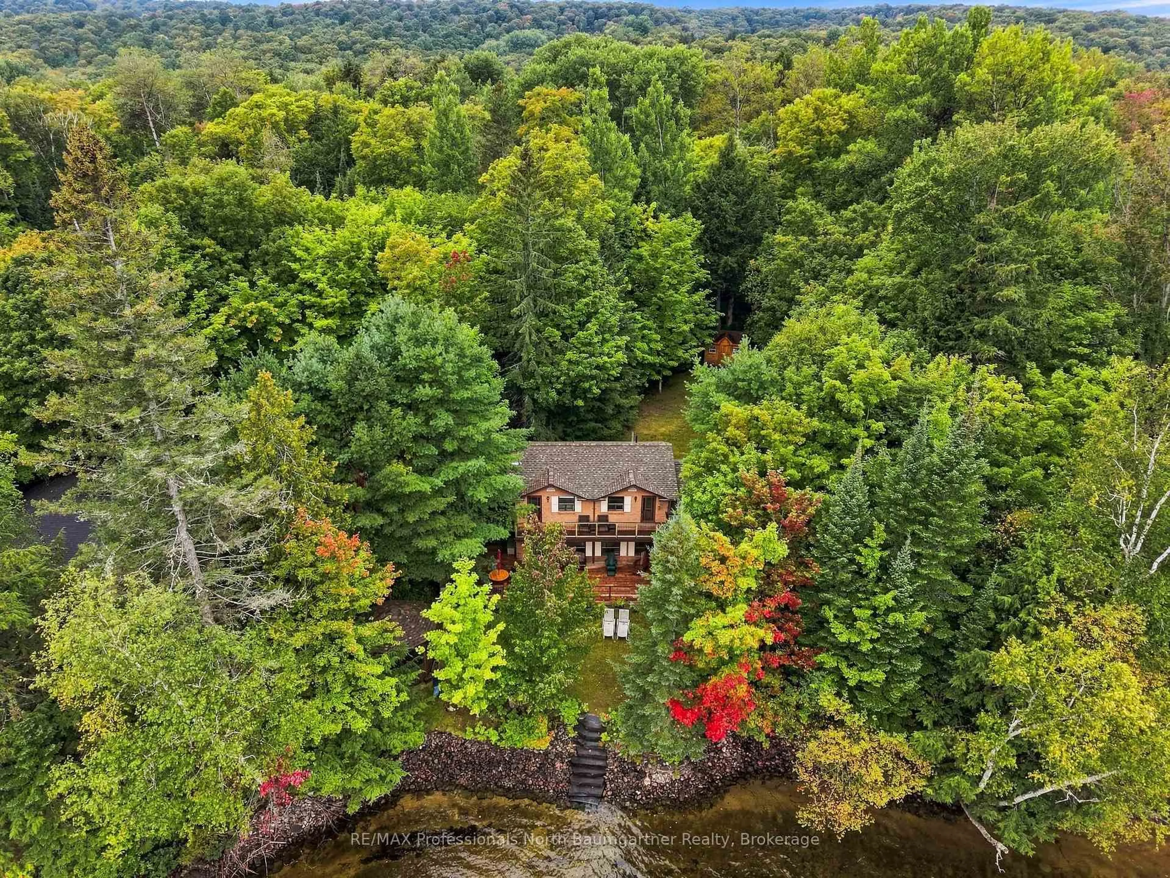 A pic from outside/outdoor area/front of a property/back of a property/a pic from drone, water/lake/river/ocean view for 5932 Haliburton Lake Rd, Dysart et al Ontario K0M 1S0