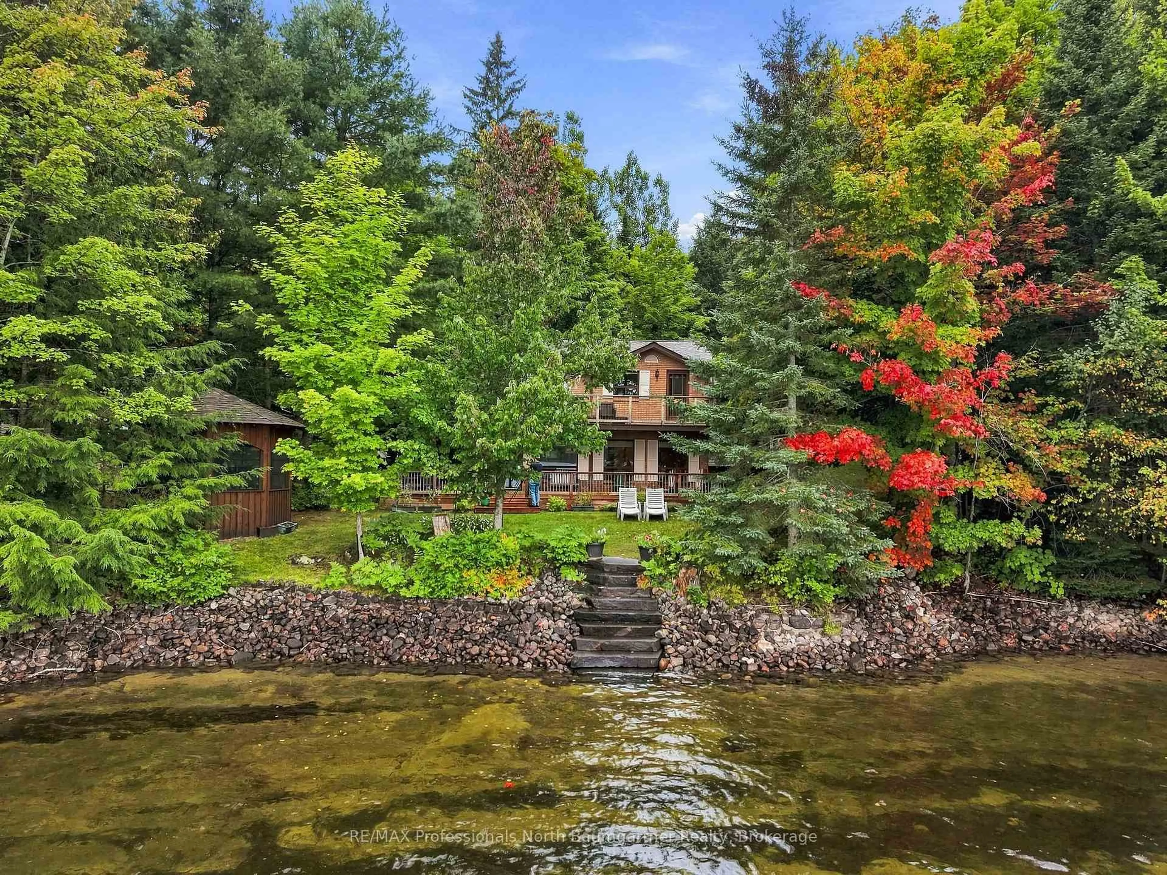 A pic from outside/outdoor area/front of a property/back of a property/a pic from drone, water/lake/river/ocean view for 5932 Haliburton Lake Rd, Dysart et al Ontario K0M 1S0