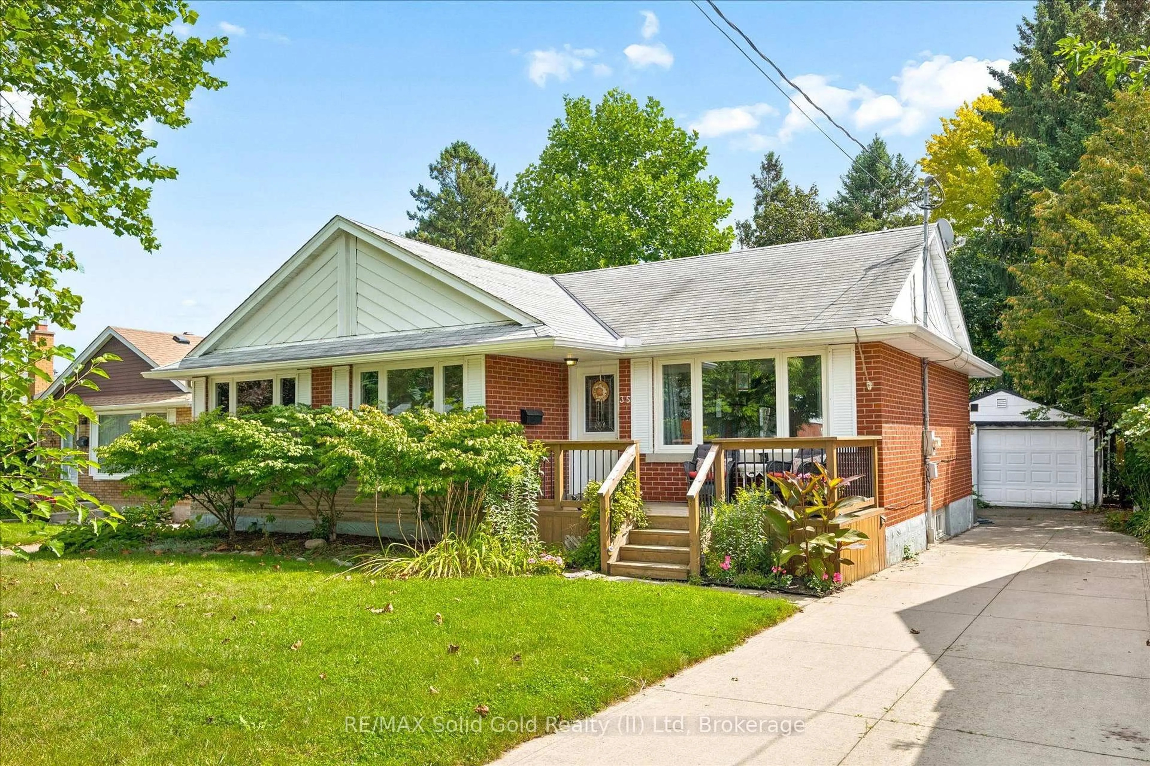 Home with brick exterior material, street for 35 Edinburgh Rd, Kitchener Ontario N2B 1M4