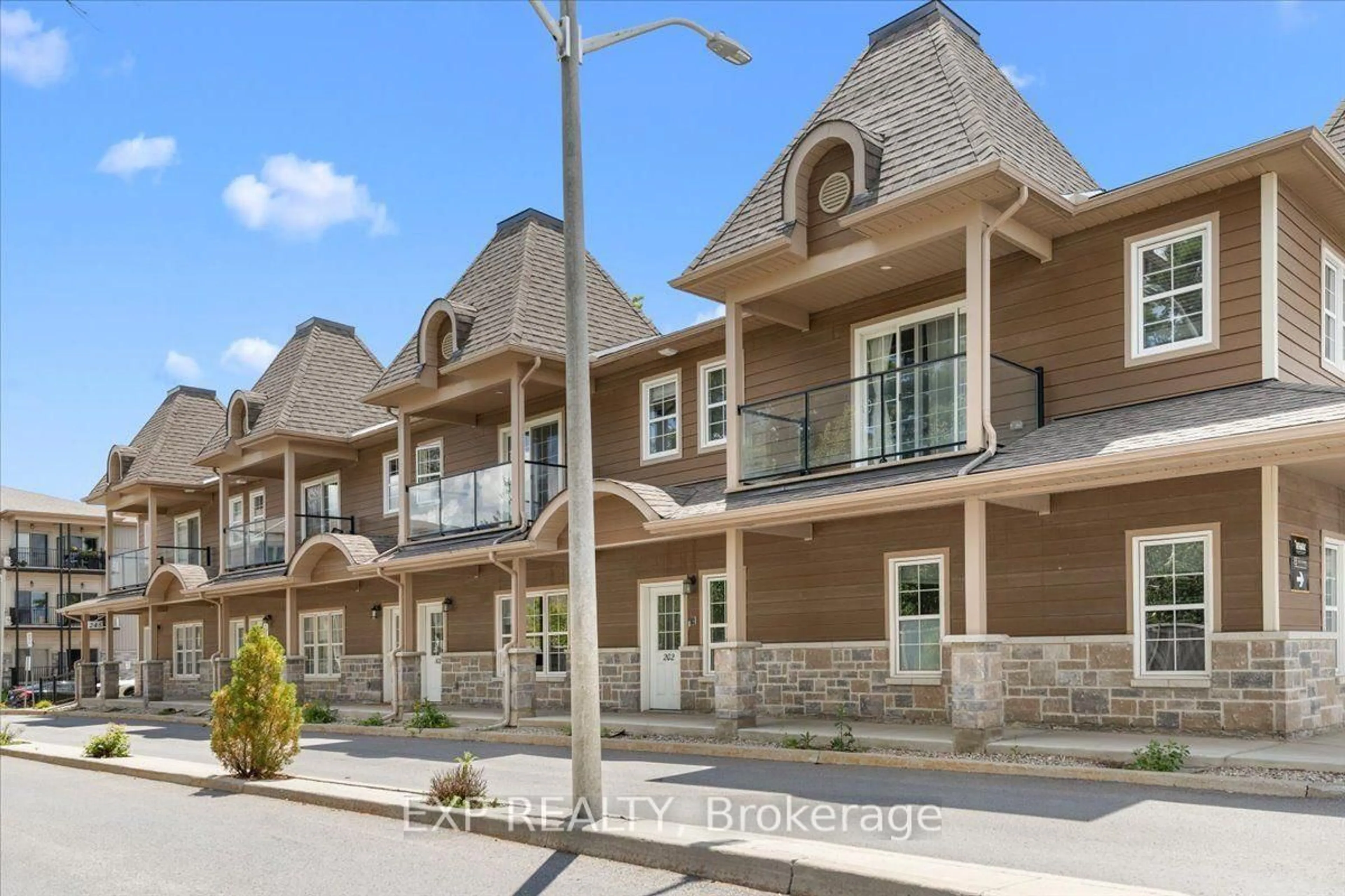 Patio, street for 245 Equinox Dr #202, Russell Ontario K0A 1W0