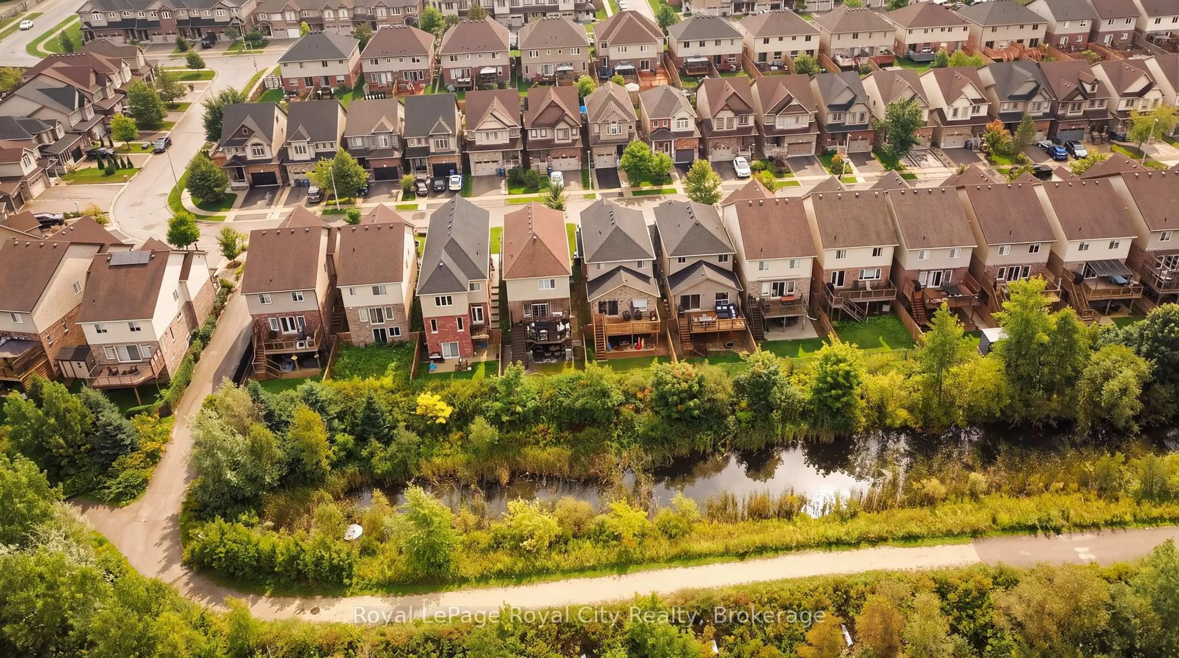 A pic from outside/outdoor area/front of a property/back of a property/a pic from drone, street for 558 Starwood Dr, Guelph Ontario N1E 0L8