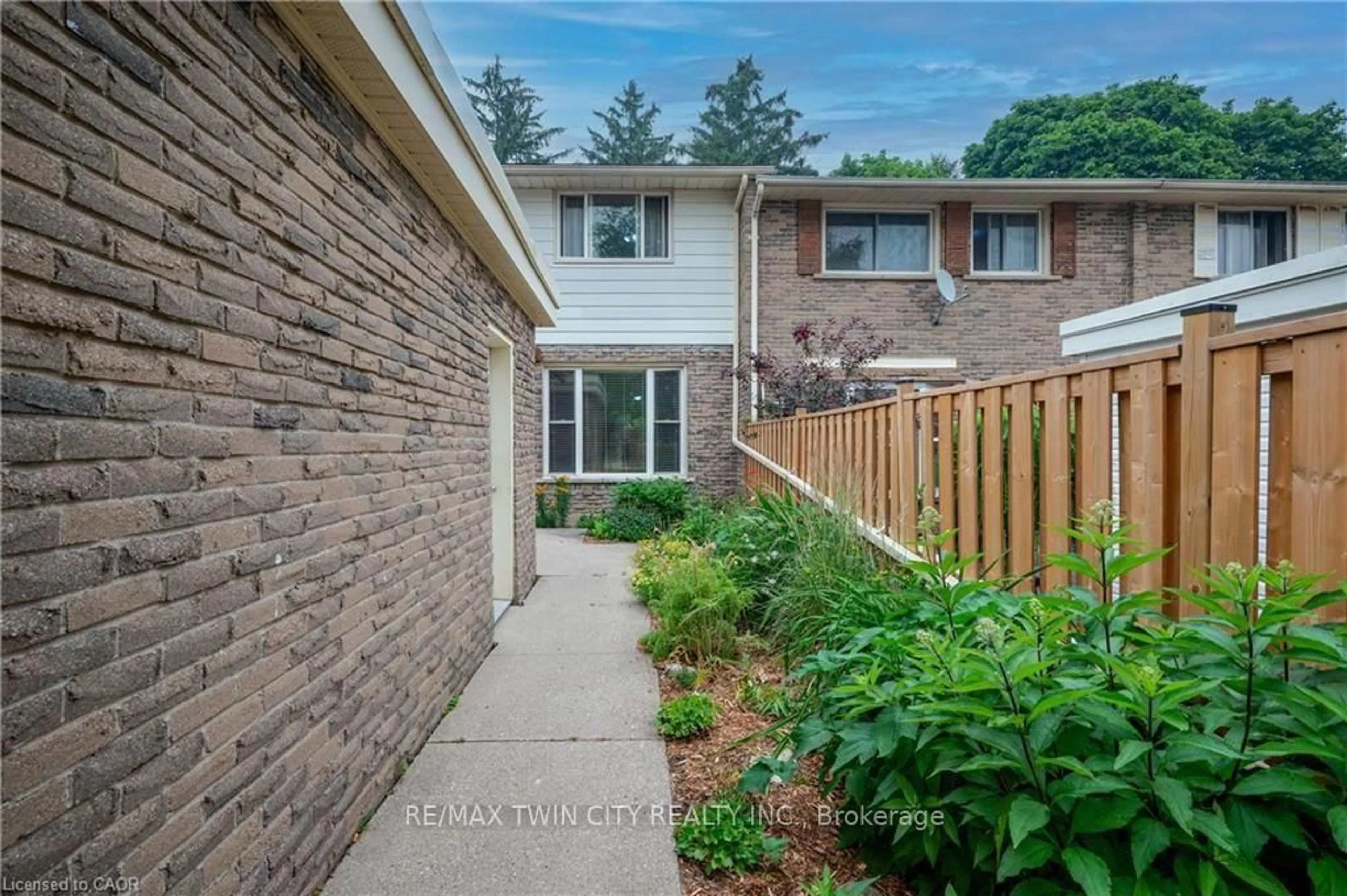 Home with brick exterior material, street for 18 Ralgreen Cres, Kitchener Ontario N2M 1T9
