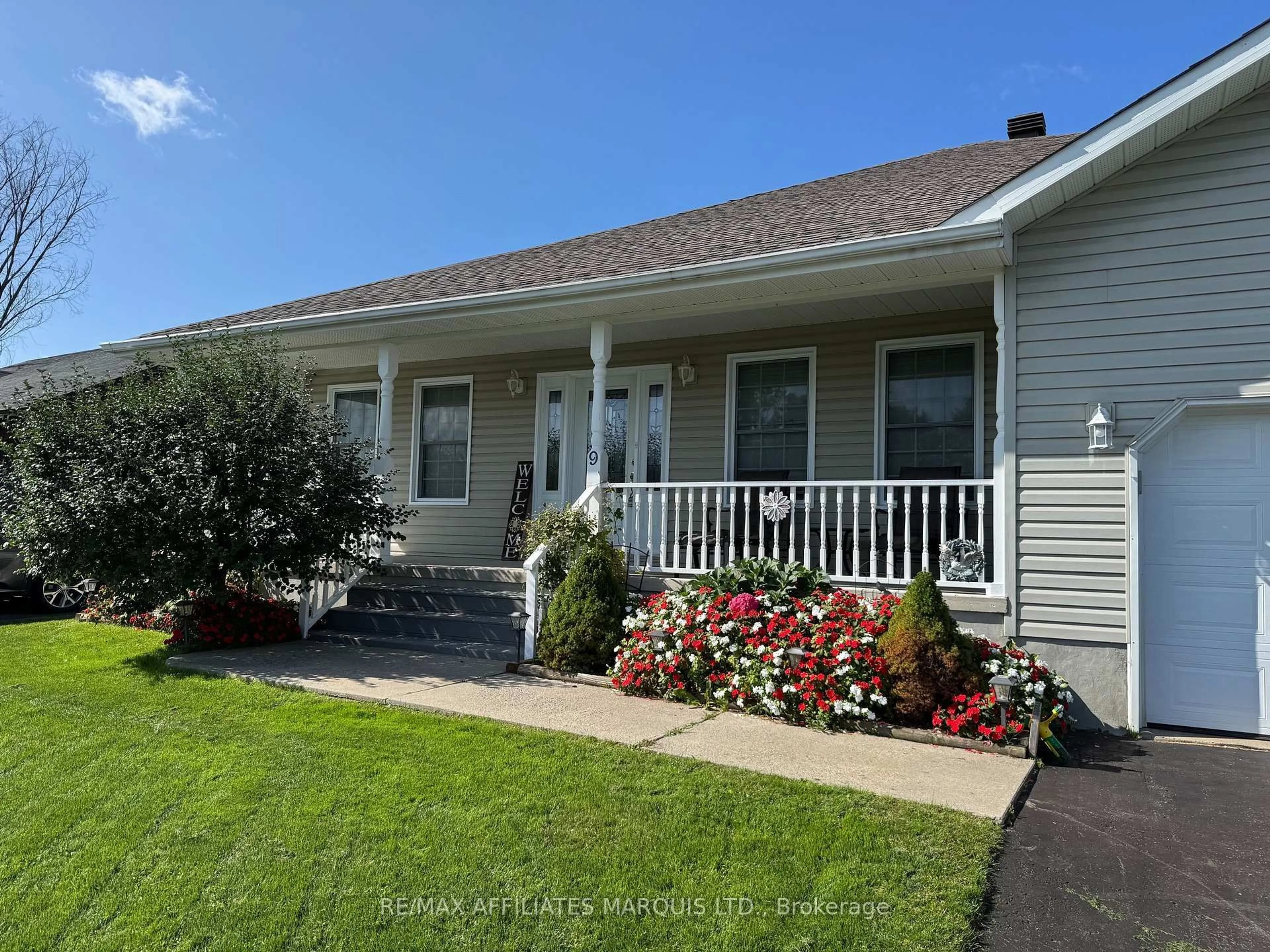 Home with vinyl exterior material, street for 9 Grove St, South Dundas Ontario K0E 1K0