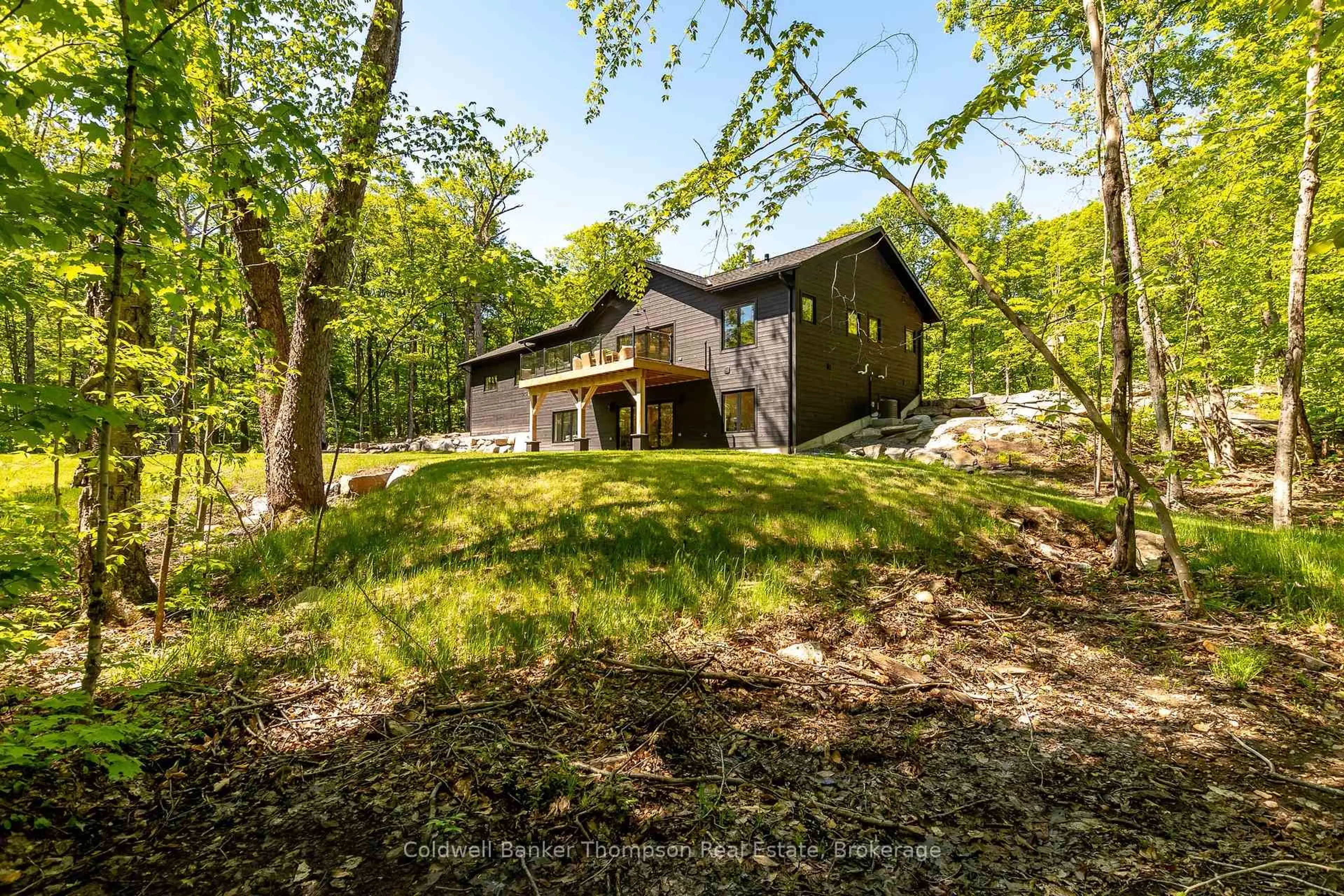 A pic from outside/outdoor area/front of a property/back of a property/a pic from drone, forest/trees view for 1161 Clearwater Shores Rd, Muskoka Lakes Ontario P0B 1J0