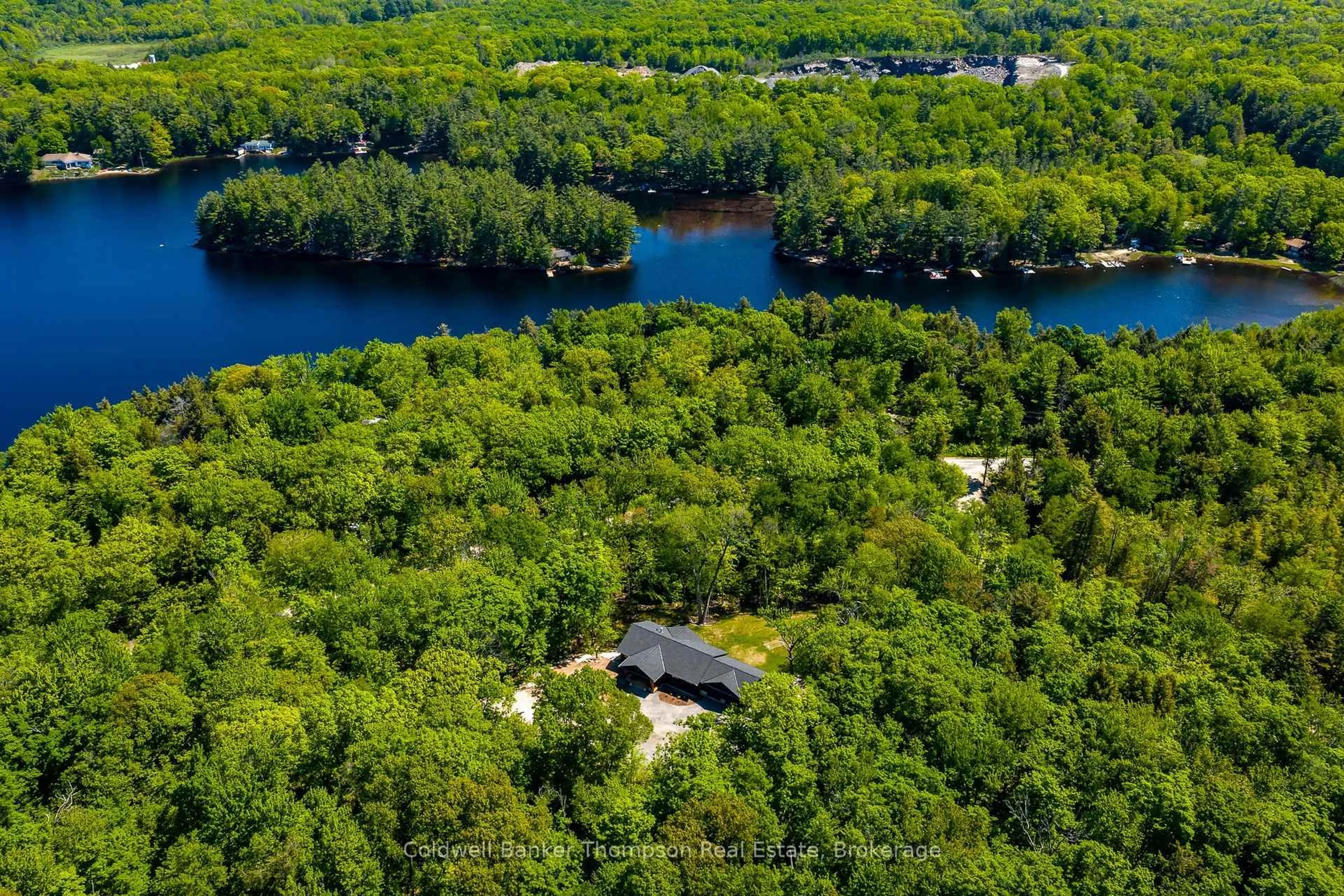 A pic from outside/outdoor area/front of a property/back of a property/a pic from drone, water/lake/river/ocean view for 1161 Clearwater Shores Rd, Muskoka Lakes Ontario P0B 1J0
