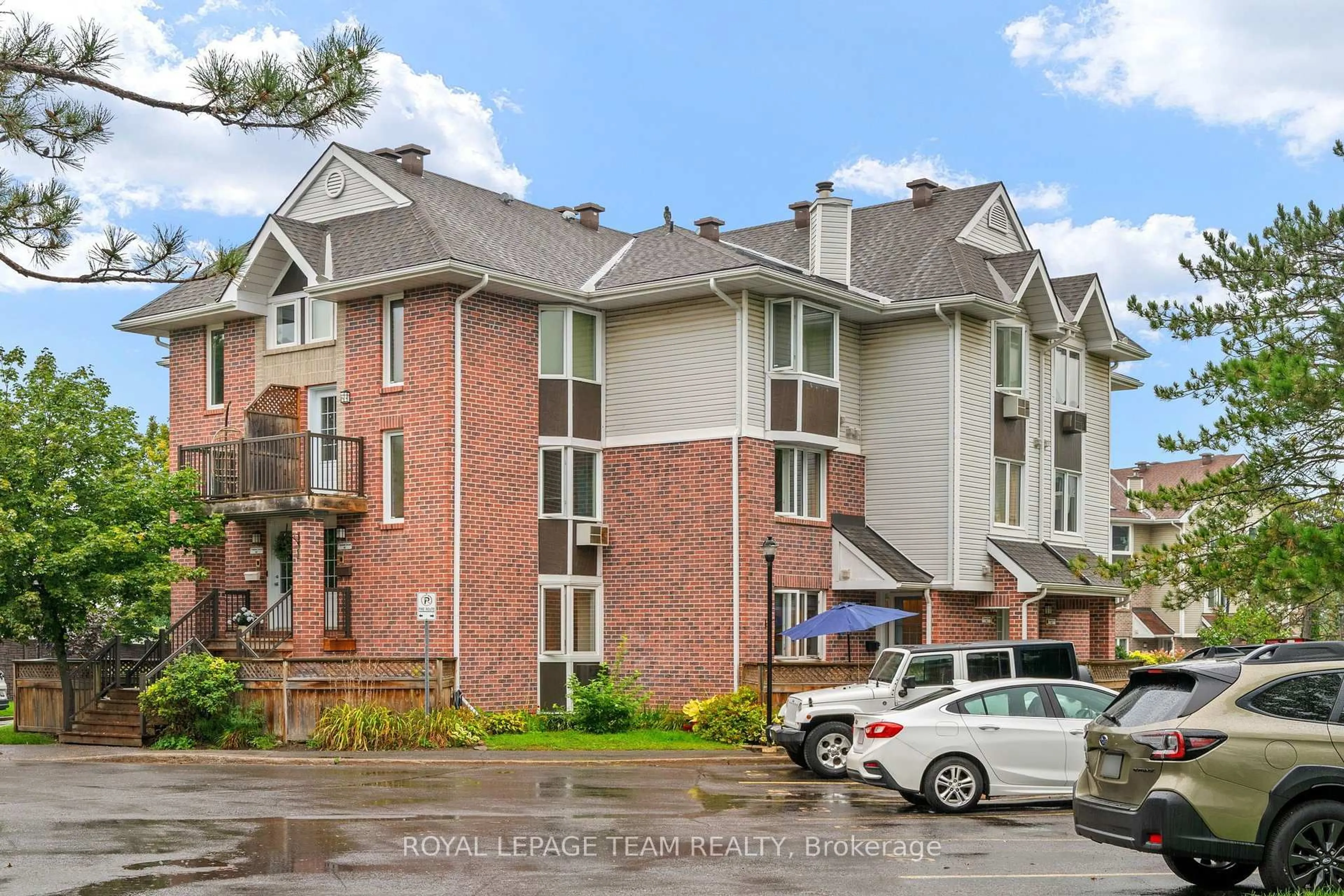 Home with brick exterior material, street for 12-2 Stonebank Cres #12, Ottawa Ontario K2H 9M4