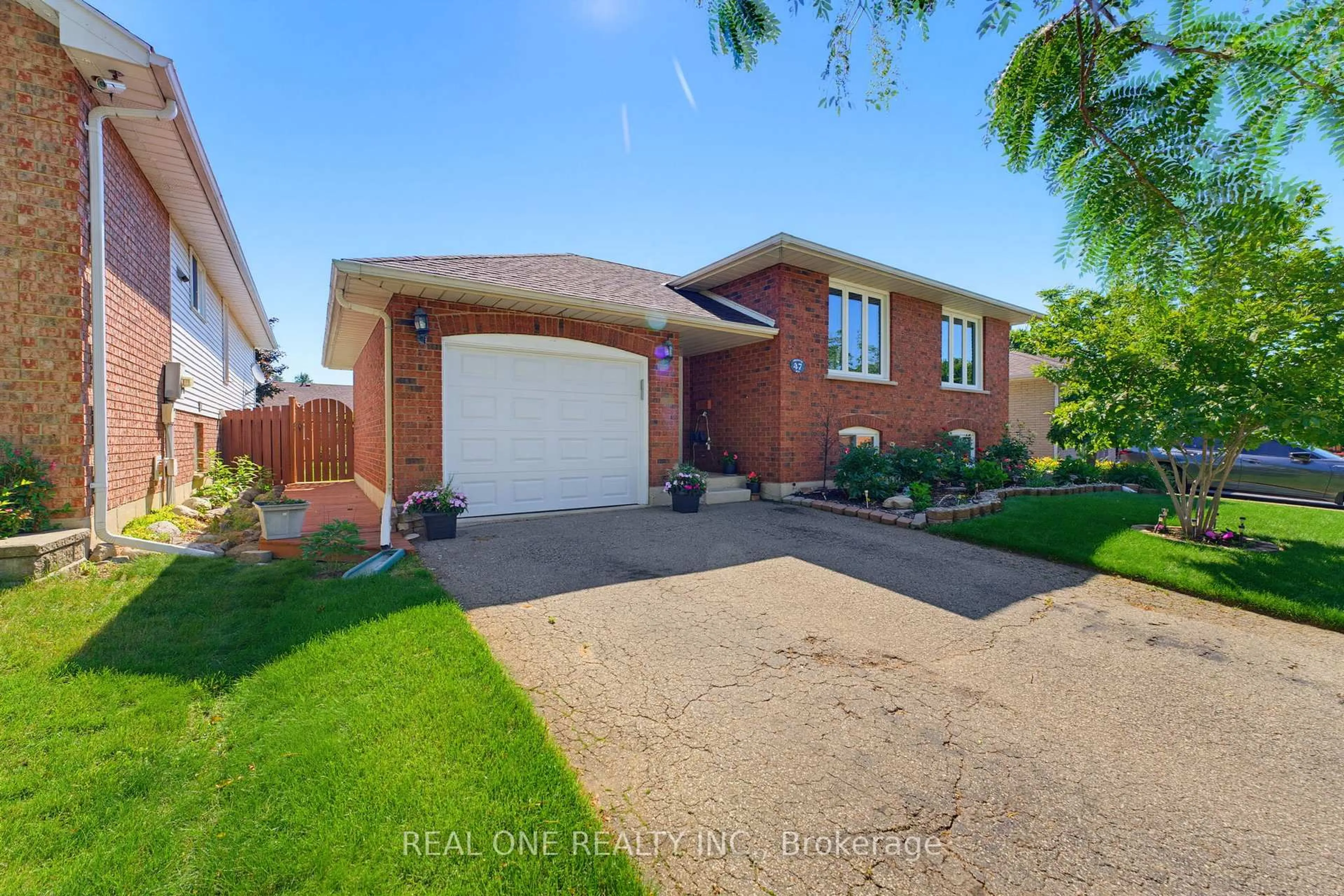 Home with brick exterior material, street for 47 Trillium Way, Brantford Ontario N3R 7T8