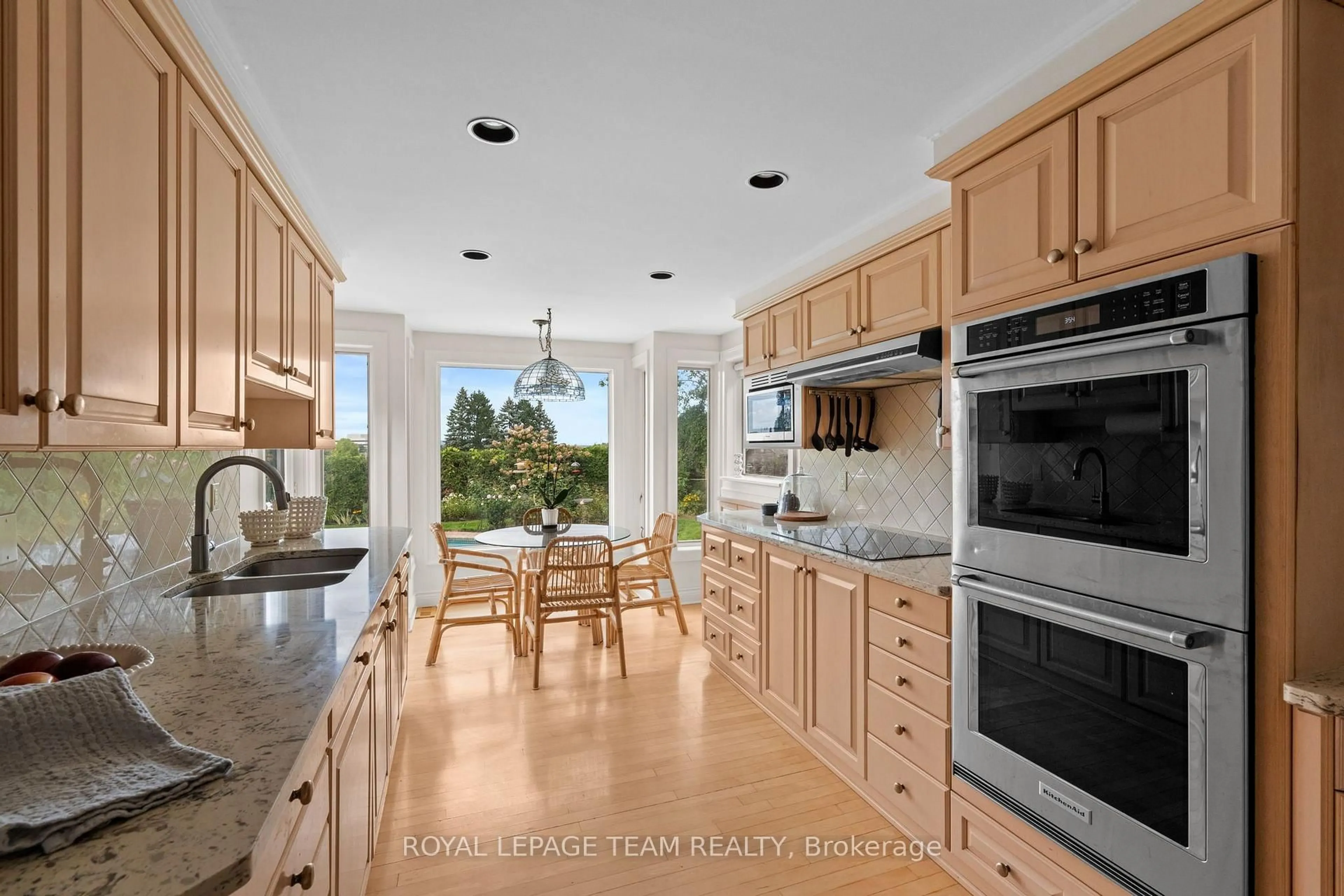 Open concept kitchen, ceramic/tile floor for 14 Lismer Cres, Kanata Ontario K2K 1A2