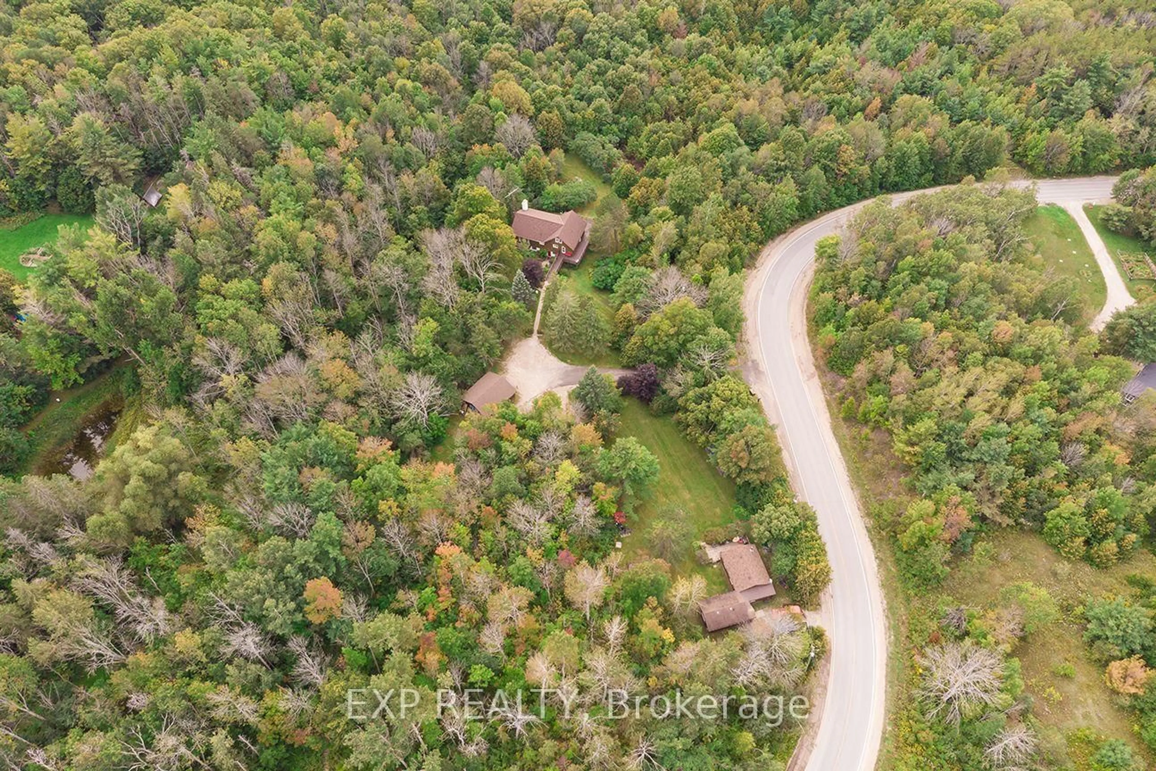 A pic from outside/outdoor area/front of a property/back of a property/a pic from drone, forest/trees view for 637166 Prince Of Wales Rd, Mulmur Ontario L0N 1S7