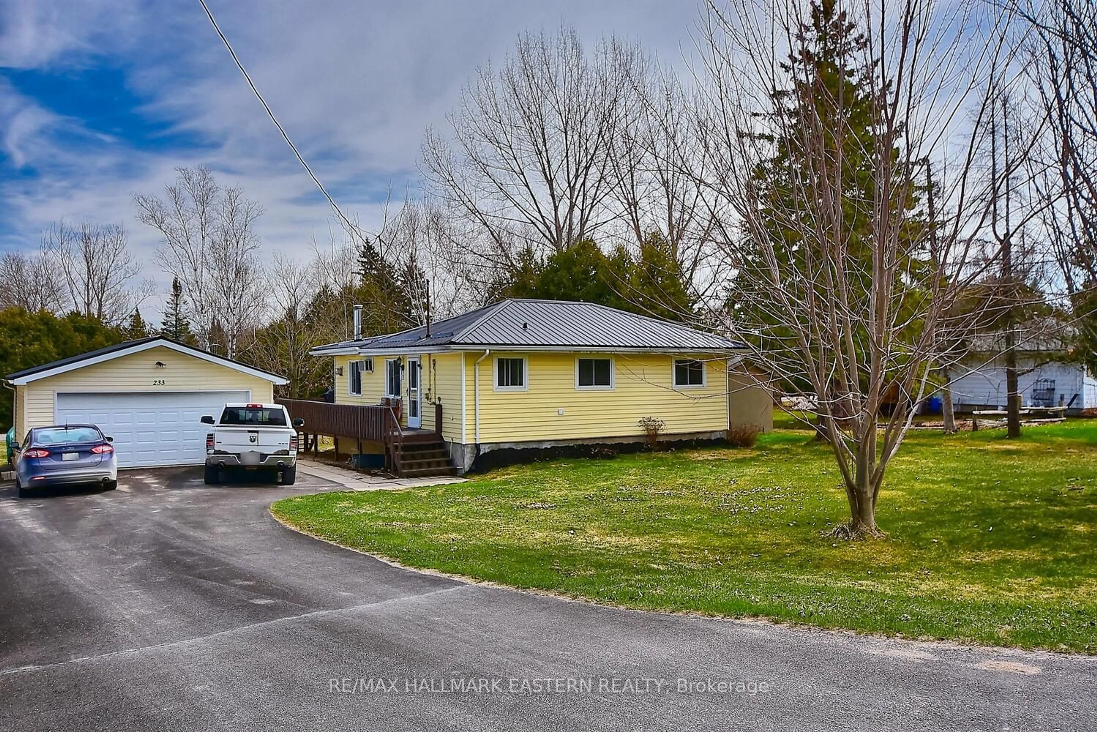 Frontside or backside of a home for 233 Crosby Dr, Kawartha Lakes Ontario K0M 1A0