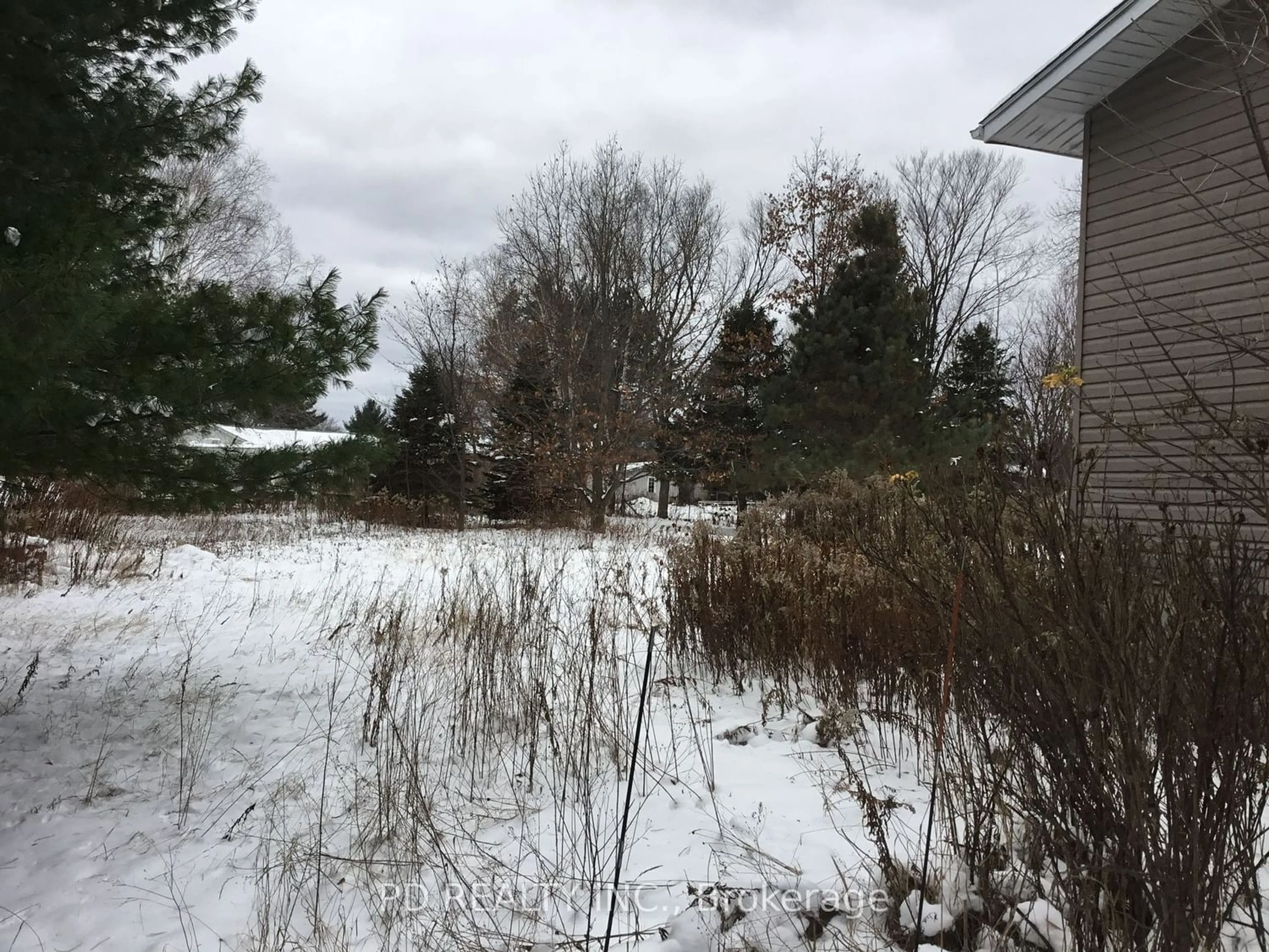 Frontside or backside of a home for 21 Riverview Dr, Huron Shores Ontario P0R 1H0