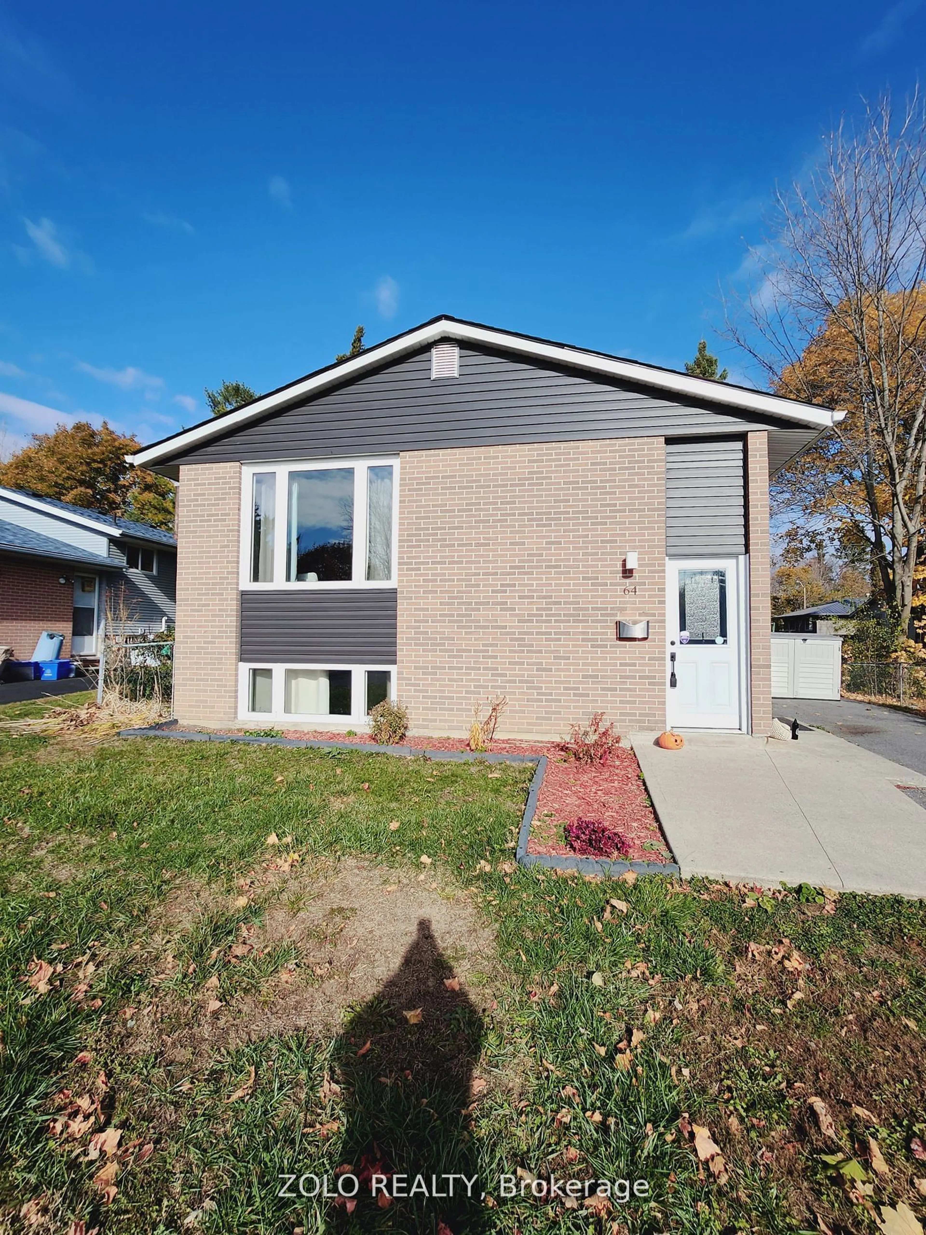Home with brick exterior material for 64 Woodstone Cres, Kingston Ontario K7M 6K9
