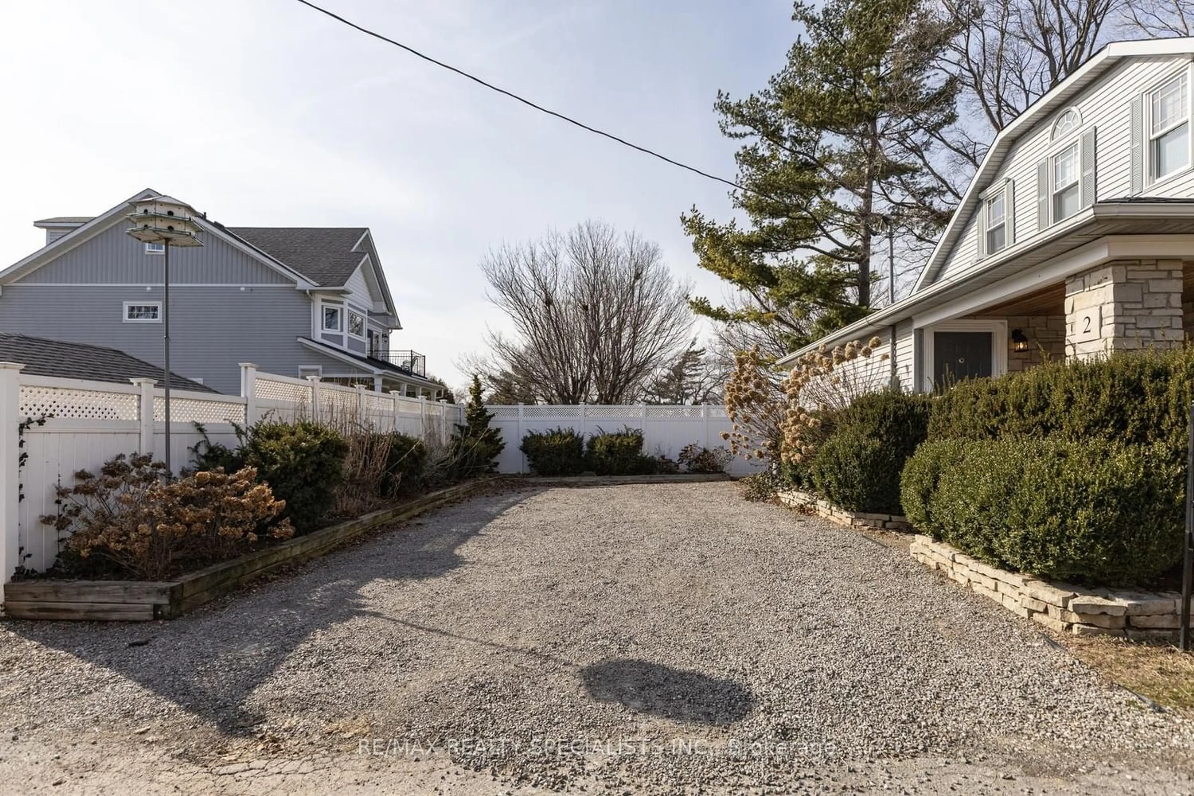 Frontside or backside of a home, the fenced backyard for 2 12th St, Grimsby Ontario L3M 2V7