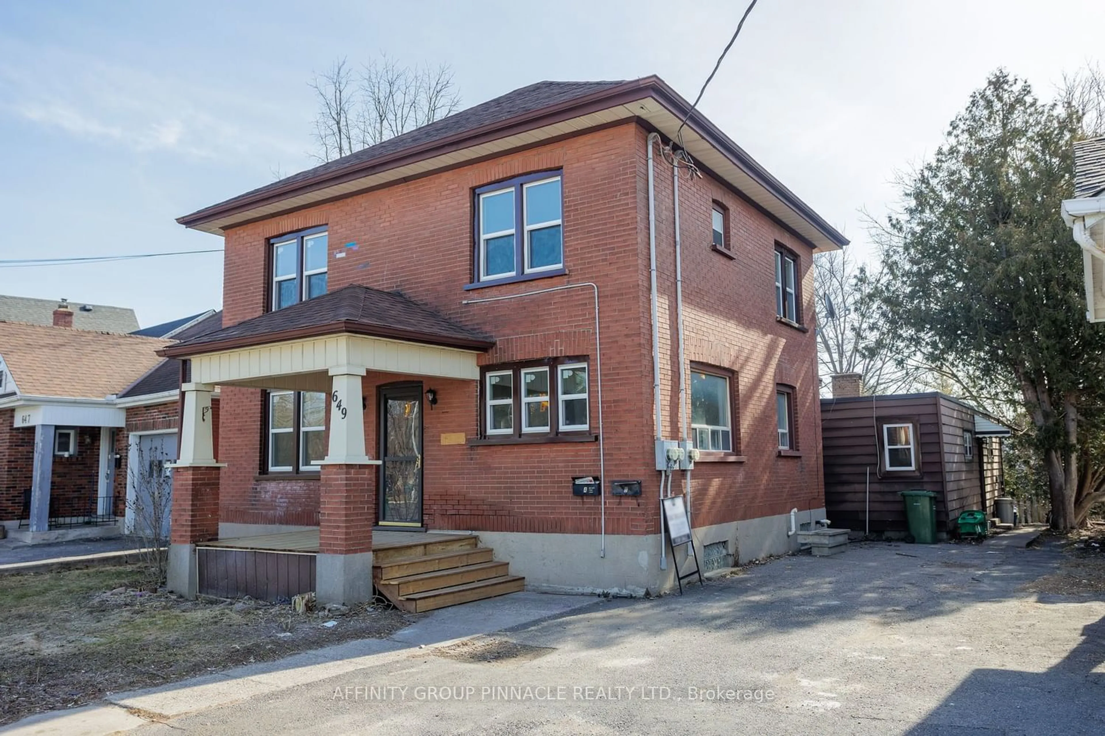 Home with brick exterior material for 649 Charlotte St, Peterborough Ontario K9J 2X2