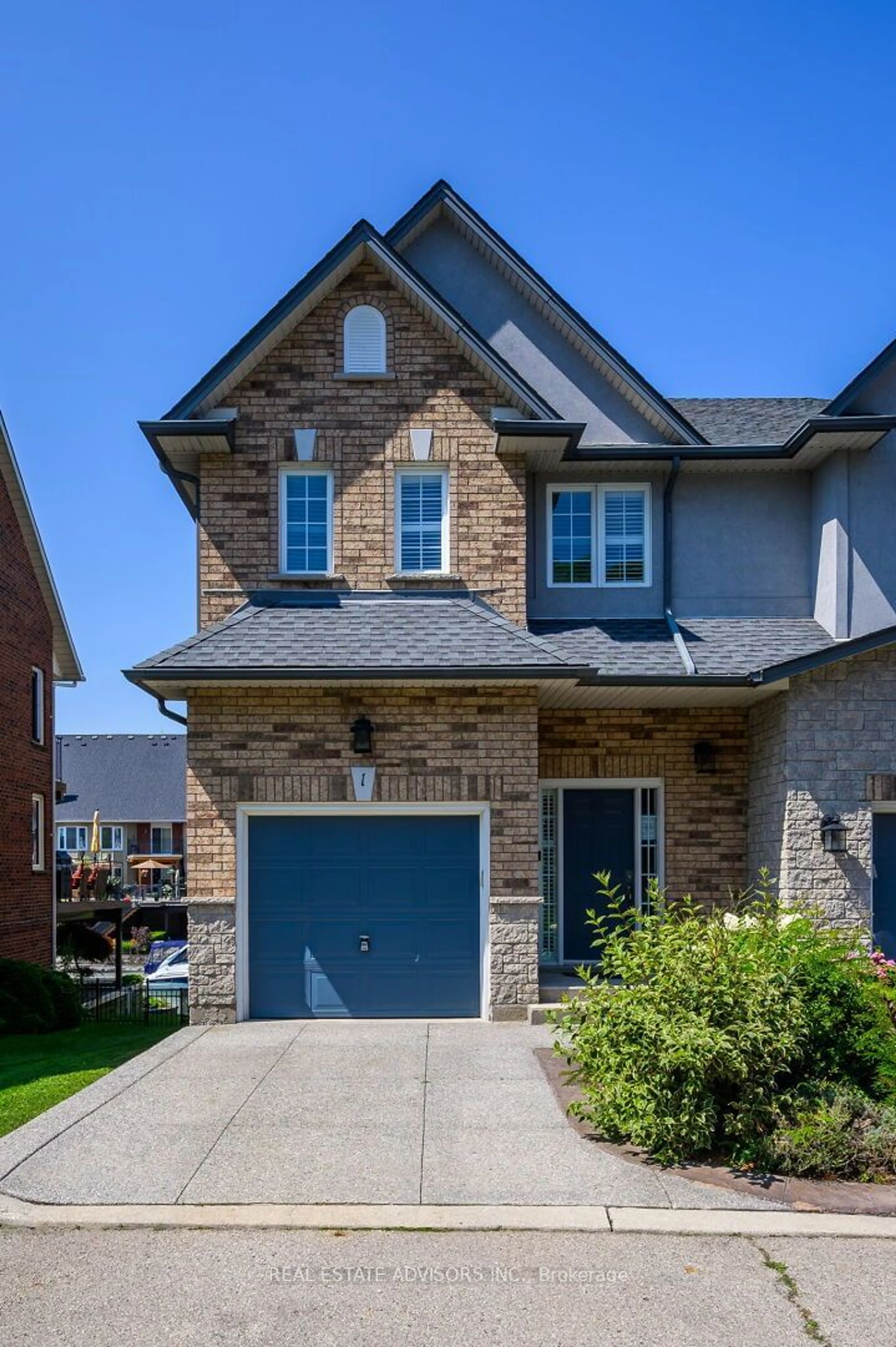 Home with brick exterior material for 97 Sunvale Pl #1, Hamilton Ontario L8E 4Z7