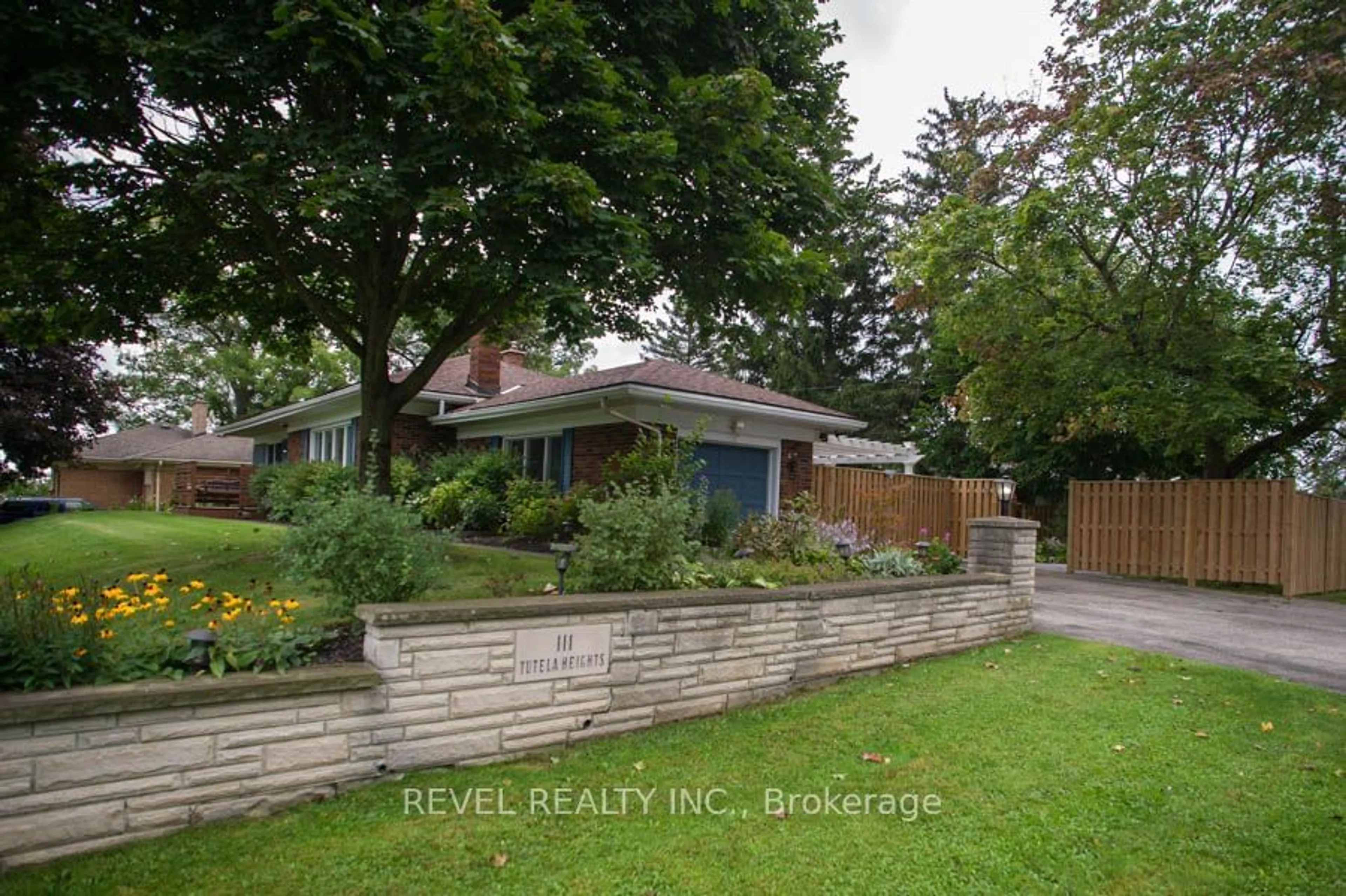 Frontside or backside of a home, the fenced backyard for 111 Tutela Heights Rd, Brantford Ontario N3T 1A5