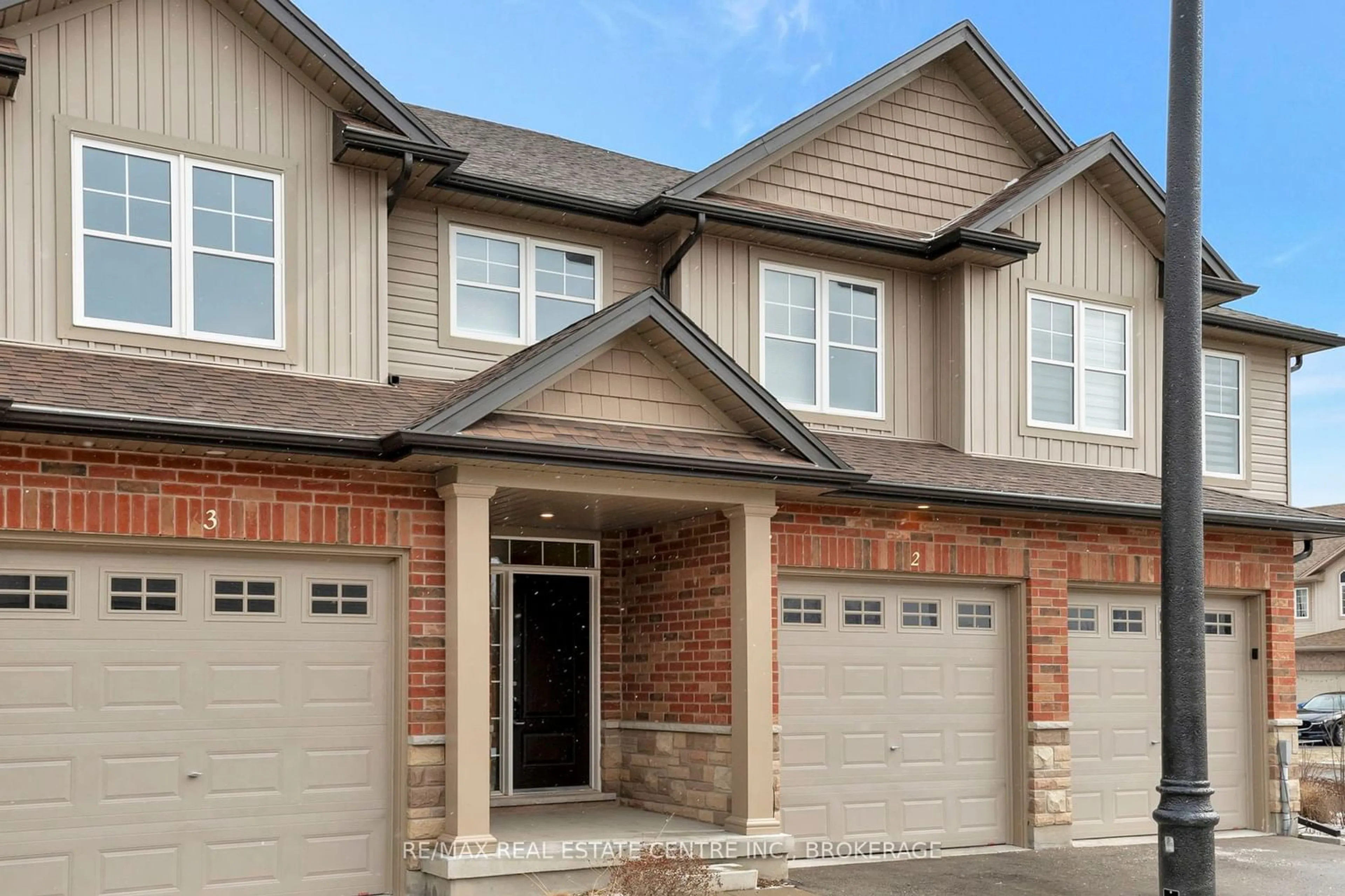 Home with brick exterior material, street for 22 MARSHALL Dr #2, Guelph Ontario N1E 0M9