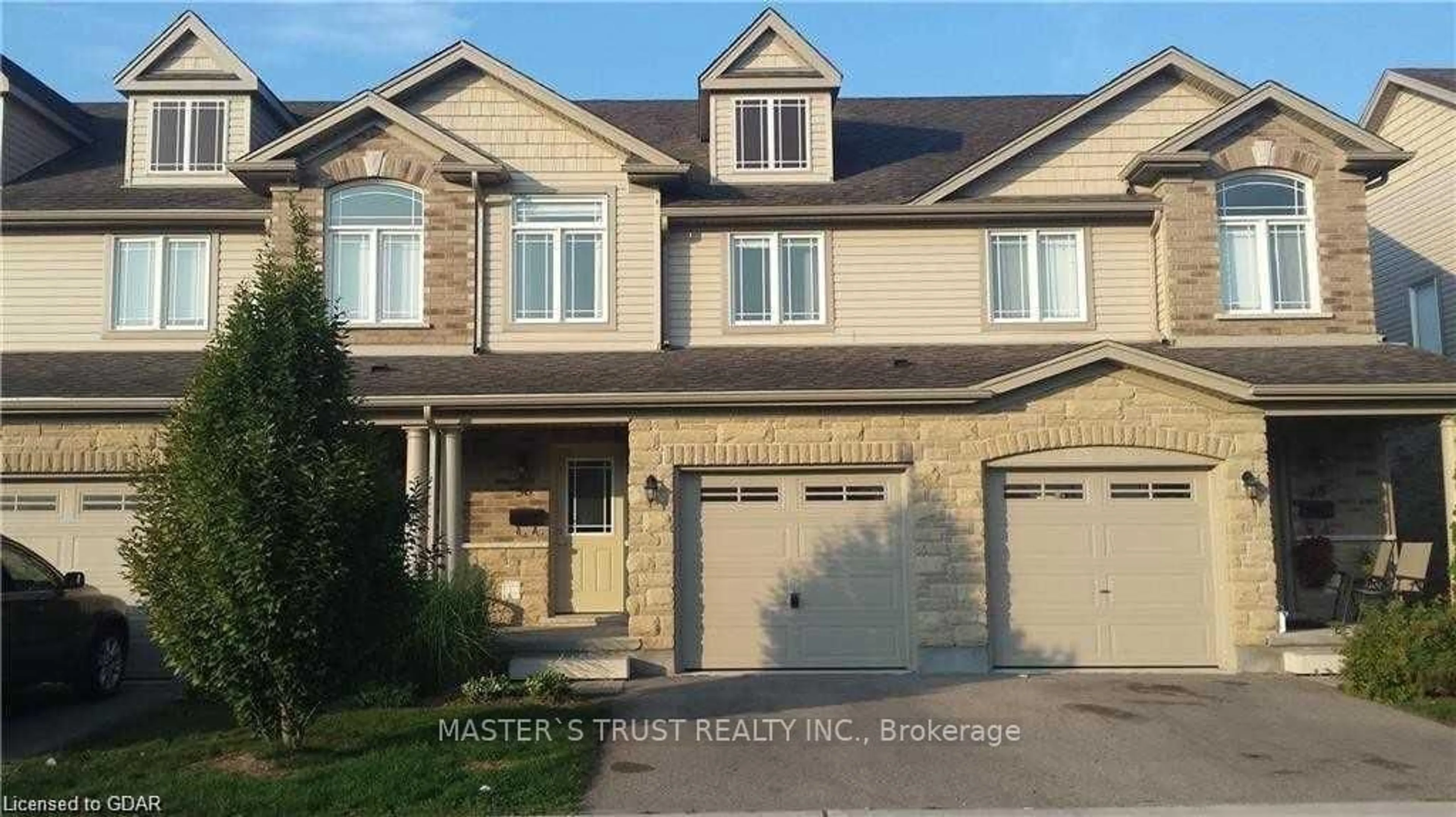 Frontside or backside of a home for 36 Waterford Dr, Guelph Ontario N1L 0H6