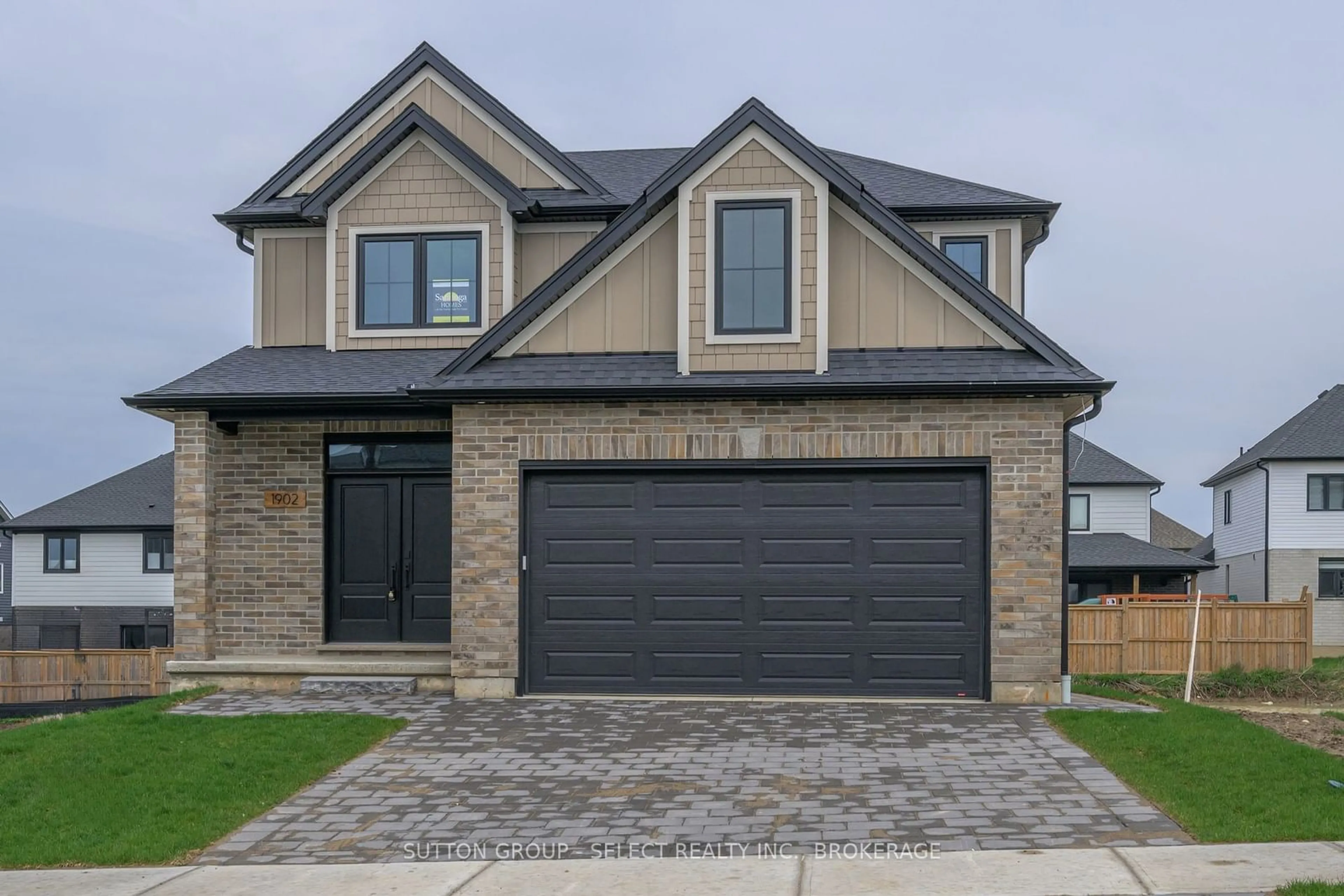 Home with brick exterior material for 1902 FOUNTAIN GRASS Dr, London Ontario N6K 4P9