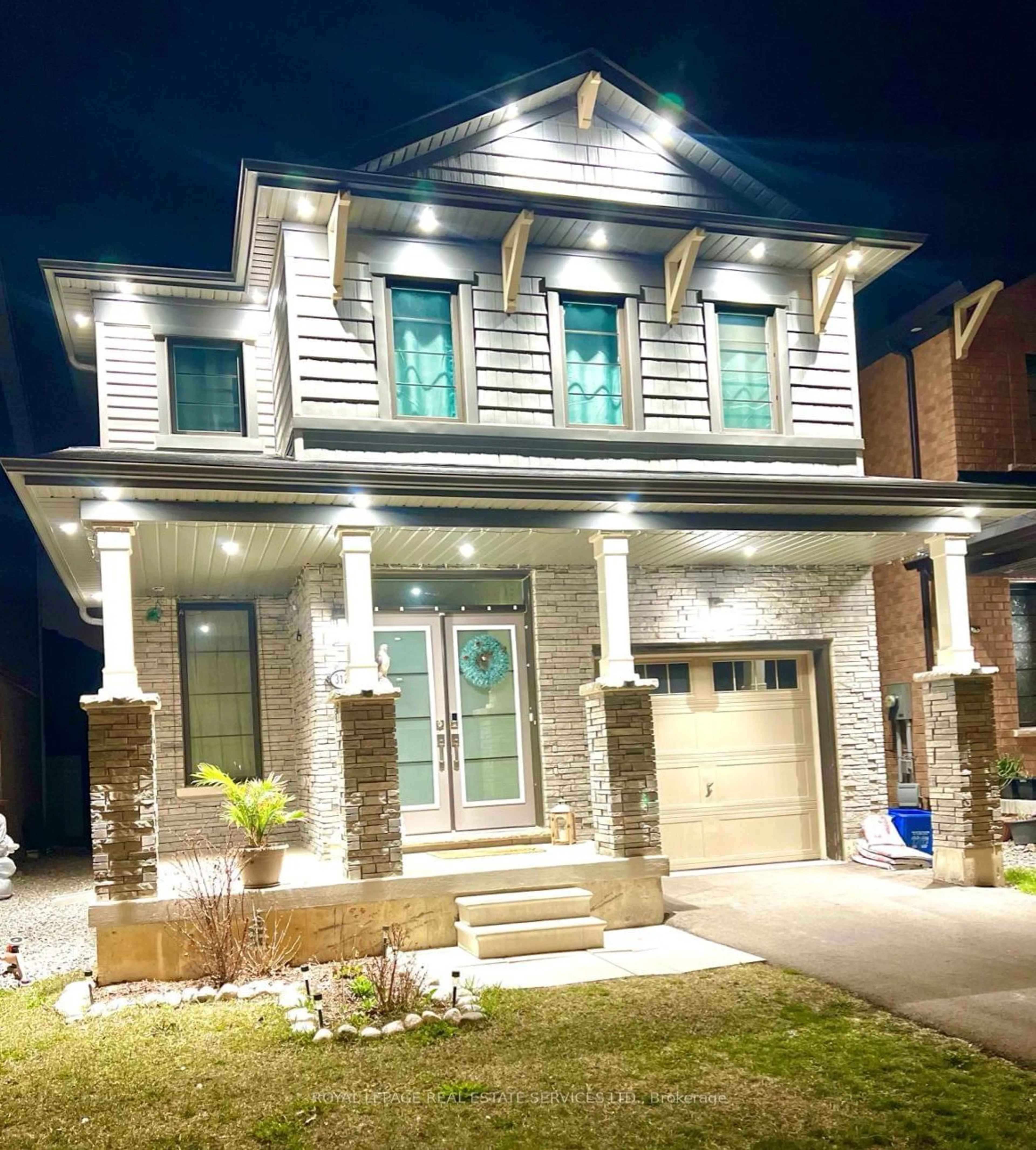 Home with brick exterior material for 312 Bedrock Dr, Hamilton Ontario L8J 0M4