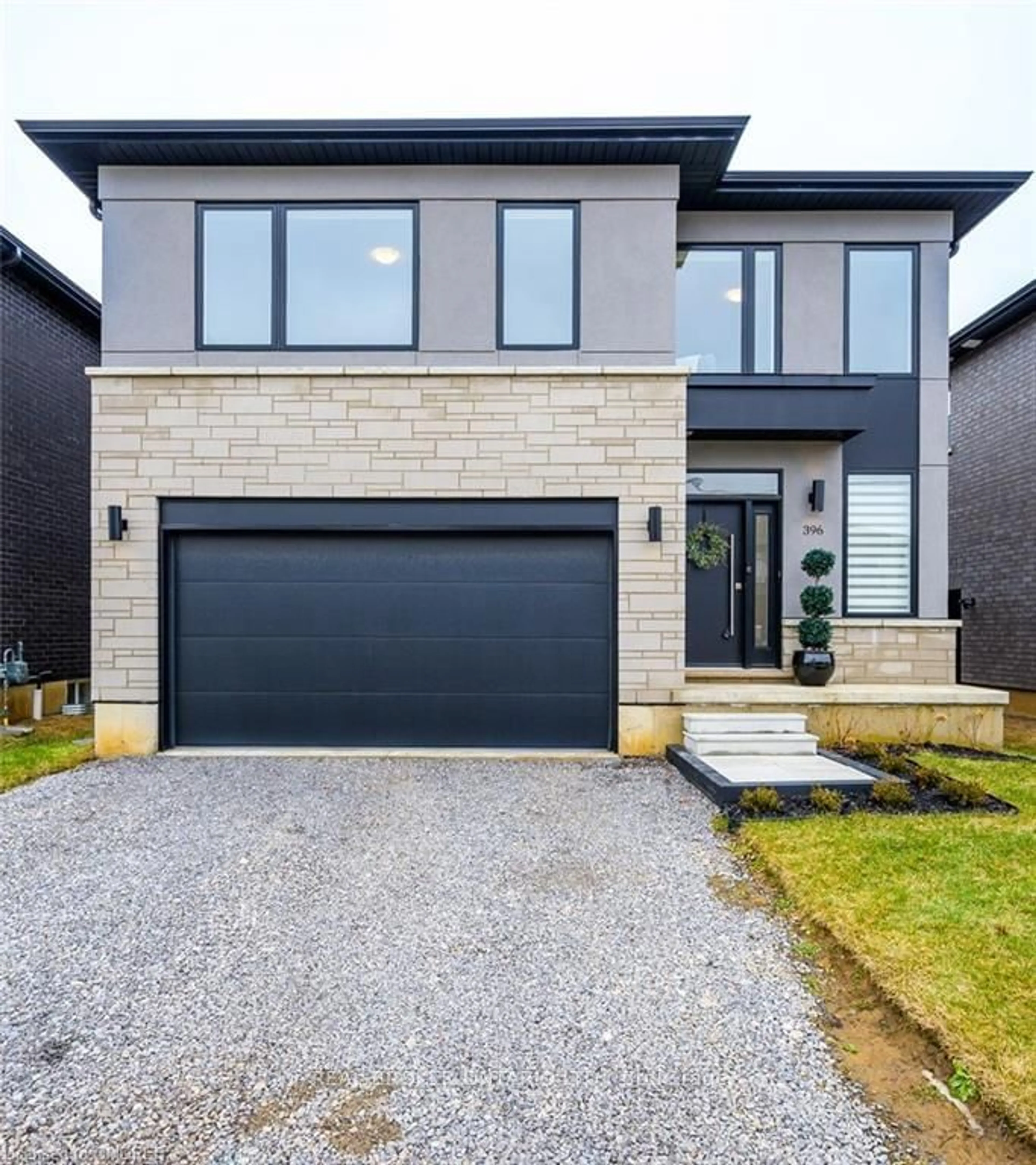 Home with brick exterior material for 396 Springbrook Ave, Hamilton Ontario L9G 3K9
