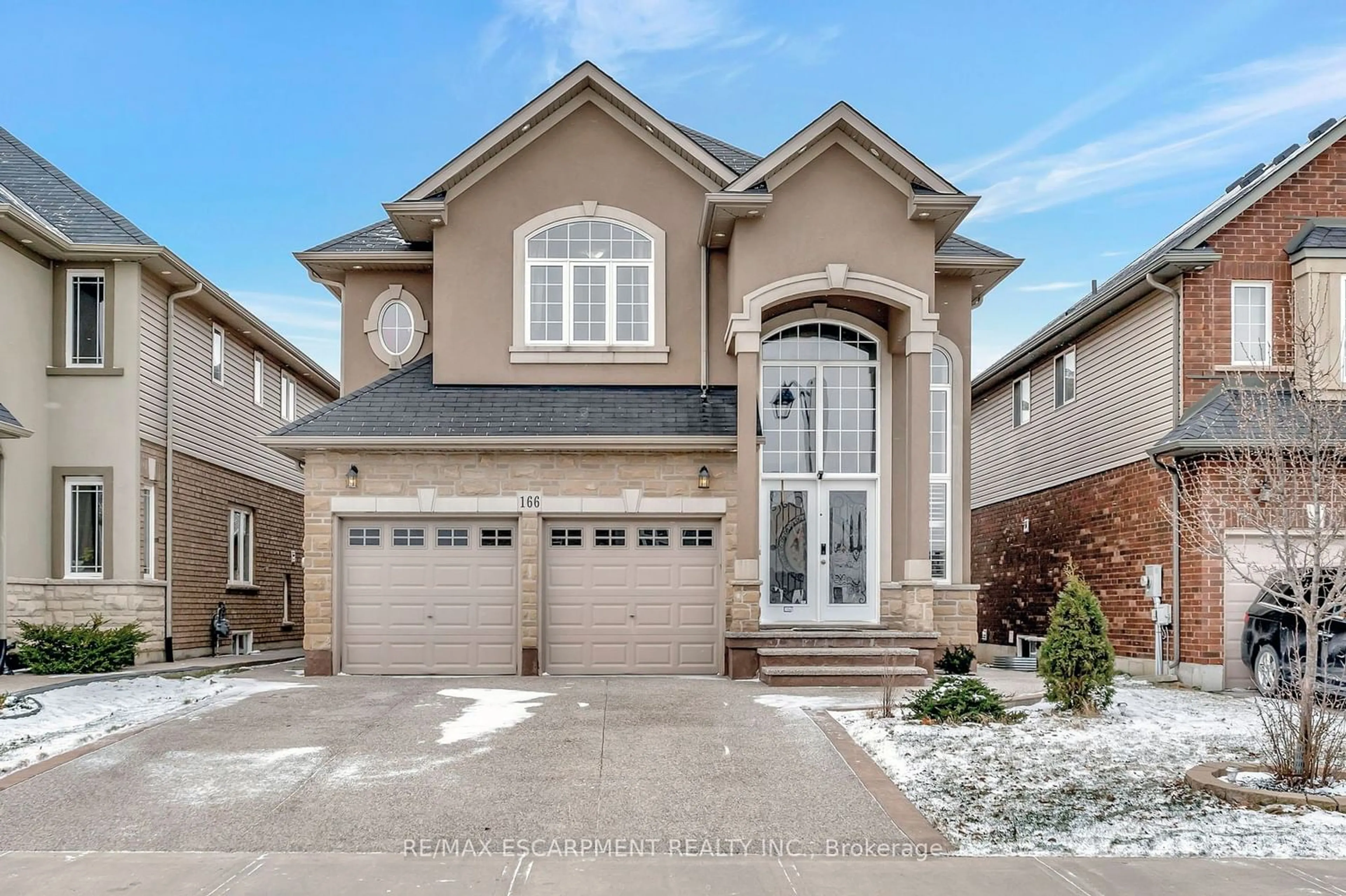 Frontside or backside of a home for 166 Bellagio Ave, Hamilton Ontario L0R 1P0