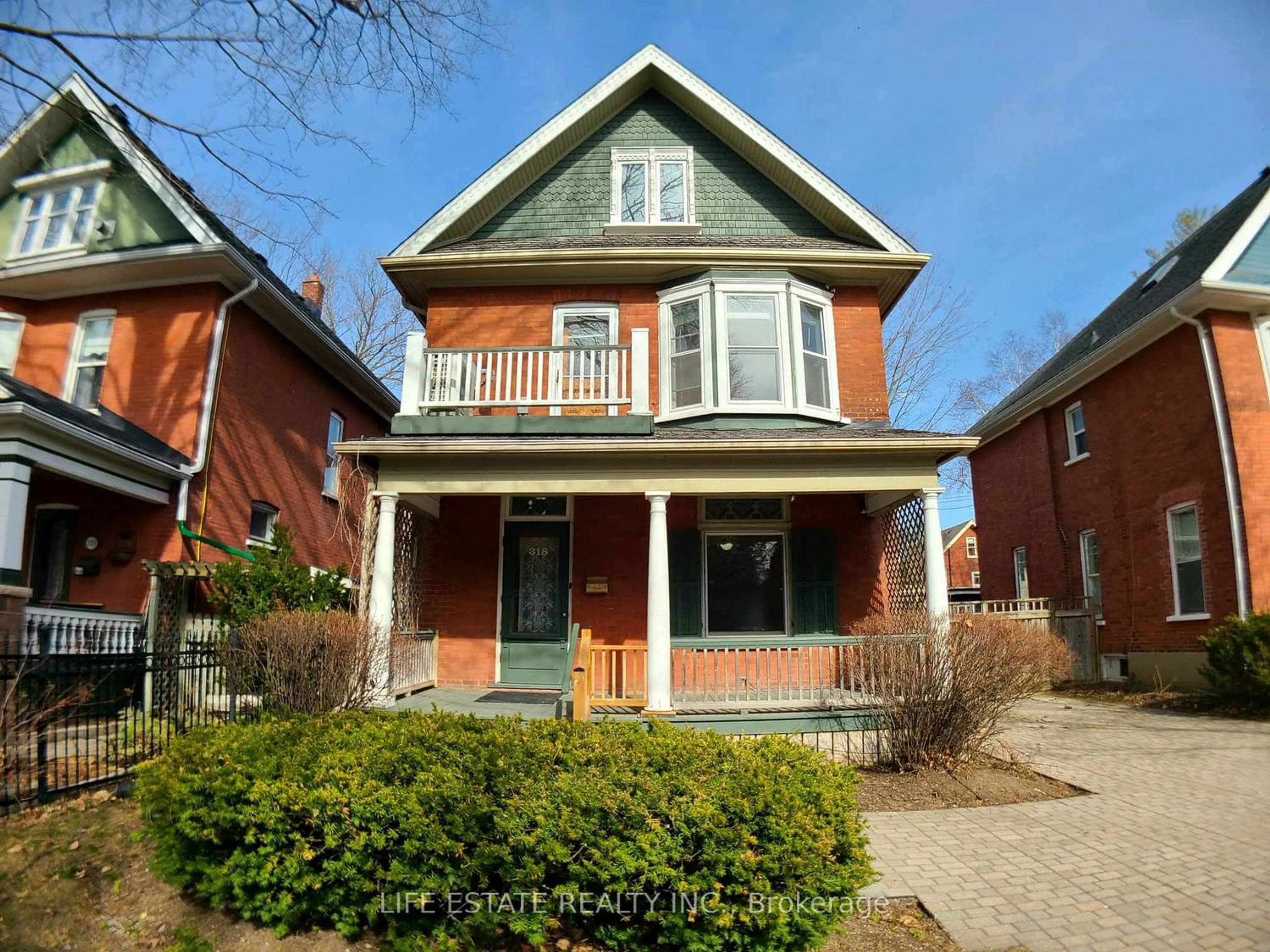 Home with brick exterior material for 318 Frederick Ave, Peterborough Ontario K9J 5H3