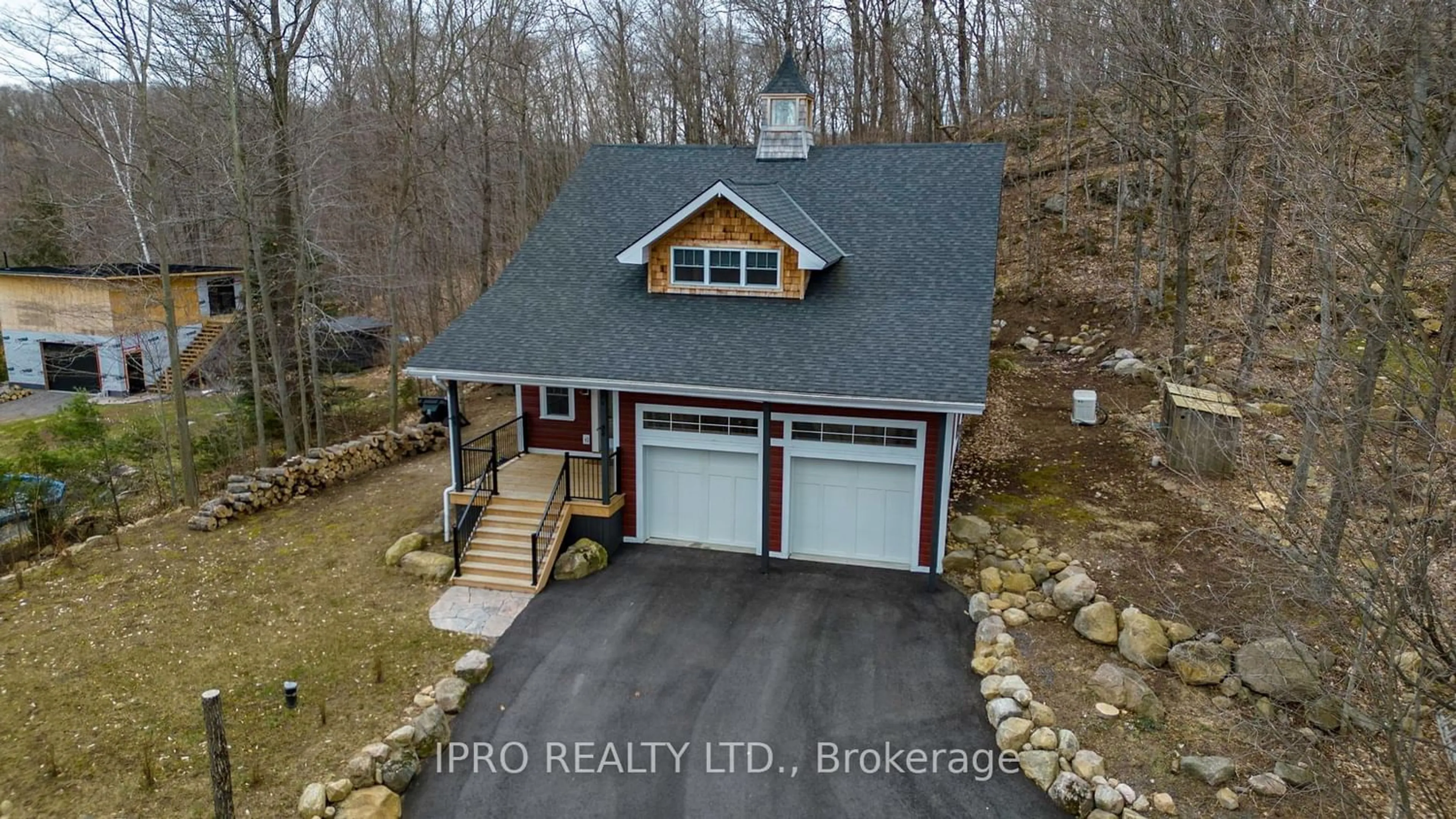 Frontside or backside of a home for 39 Todholm Dr, Muskoka Lakes Ontario P0B 1J0