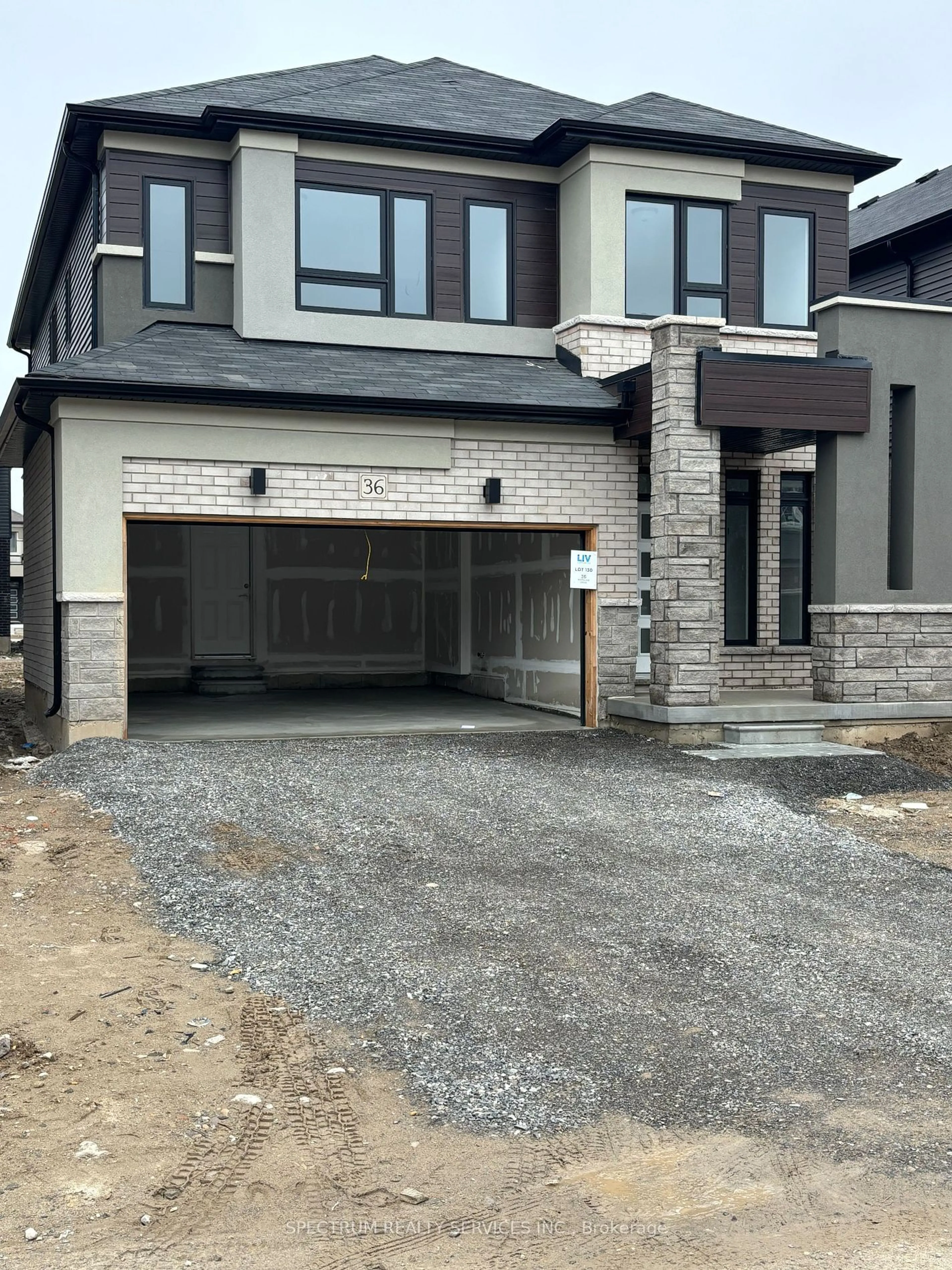 Home with brick exterior material for 36 Wakeling Dr, Brantford Ontario N3V 0B5
