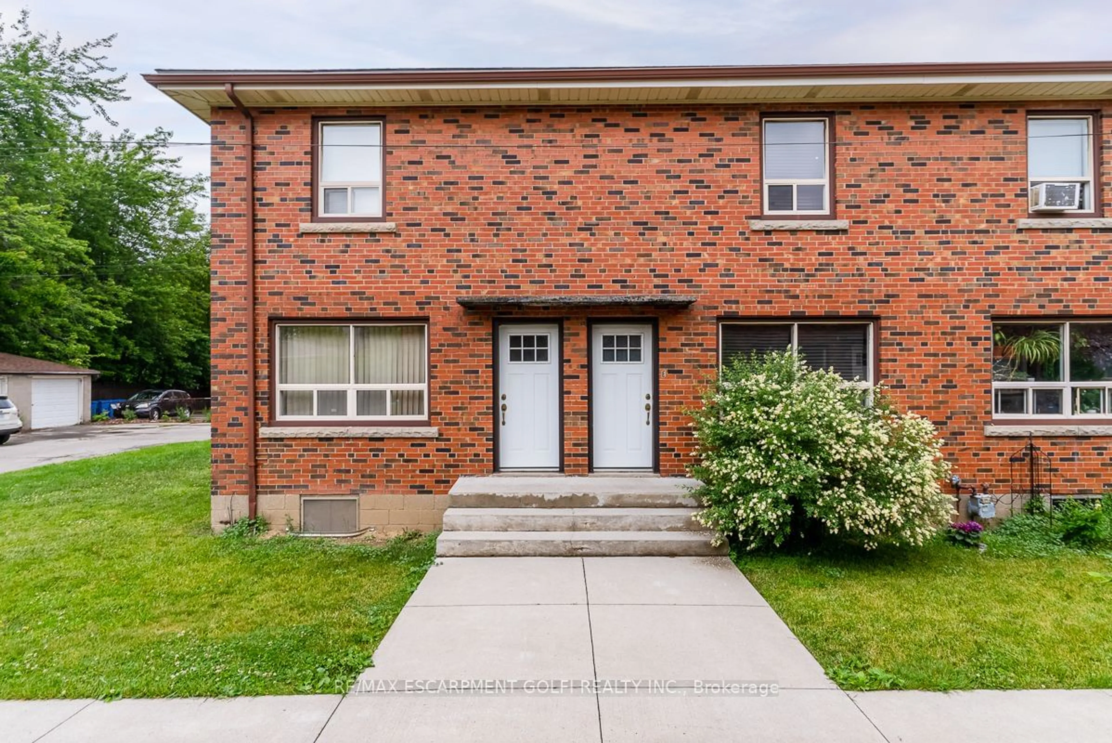 Home with brick exterior material for 424 East 42nd St #A-F, Hamilton Ontario L8T 3A9